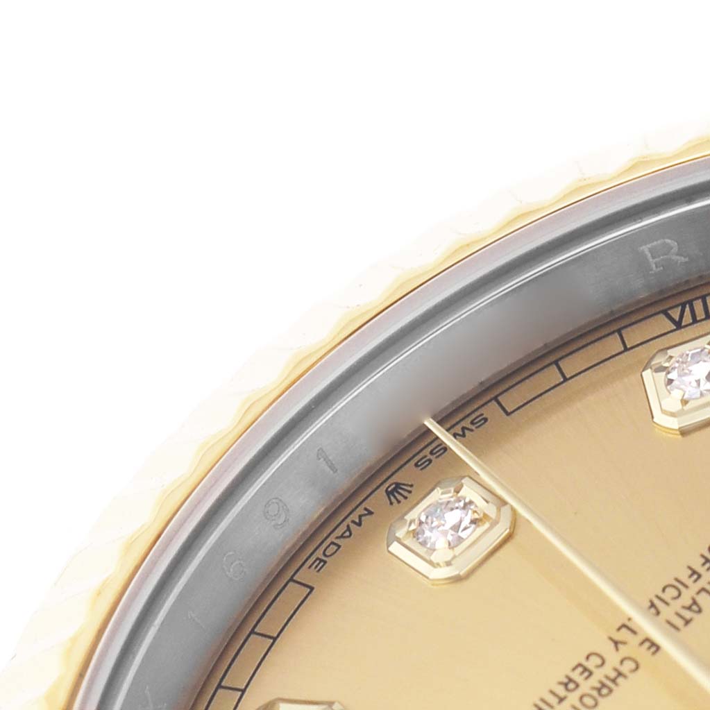 The image shows a close-up of the dial and bezel of a Rolex Datejust 41 M126333-0011 Men's Steel and Gold (two tone) Champagne Dial, highlighting the gold dial and diamond markers.