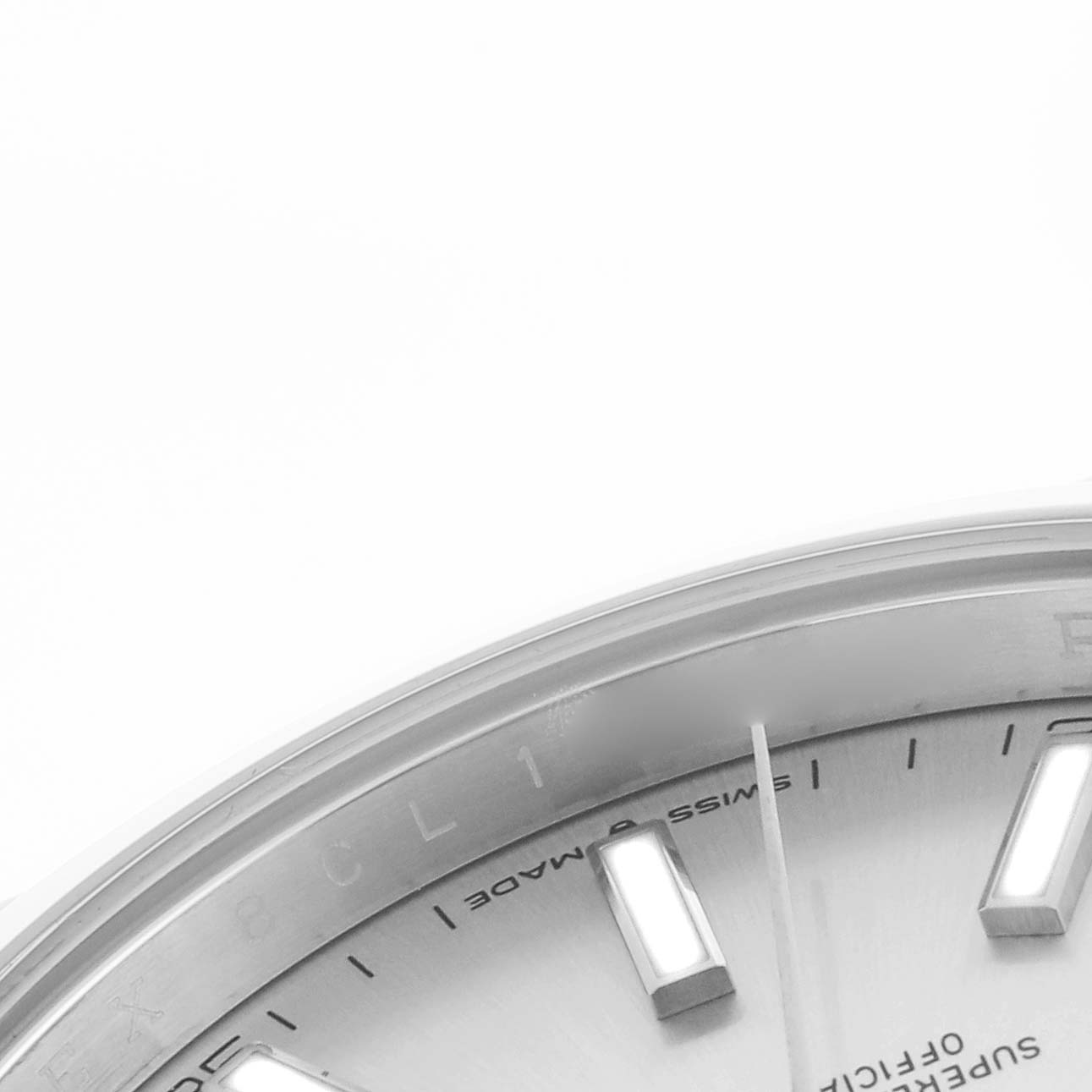 The image shows a close-up of the Rolex Datejust 41 126300 Men's Stainless Steel Silver Dial 126300 Men's Stainless Steel Silver Dial watch face, highlighting the bezel, hour markers, and a portion of the hands.