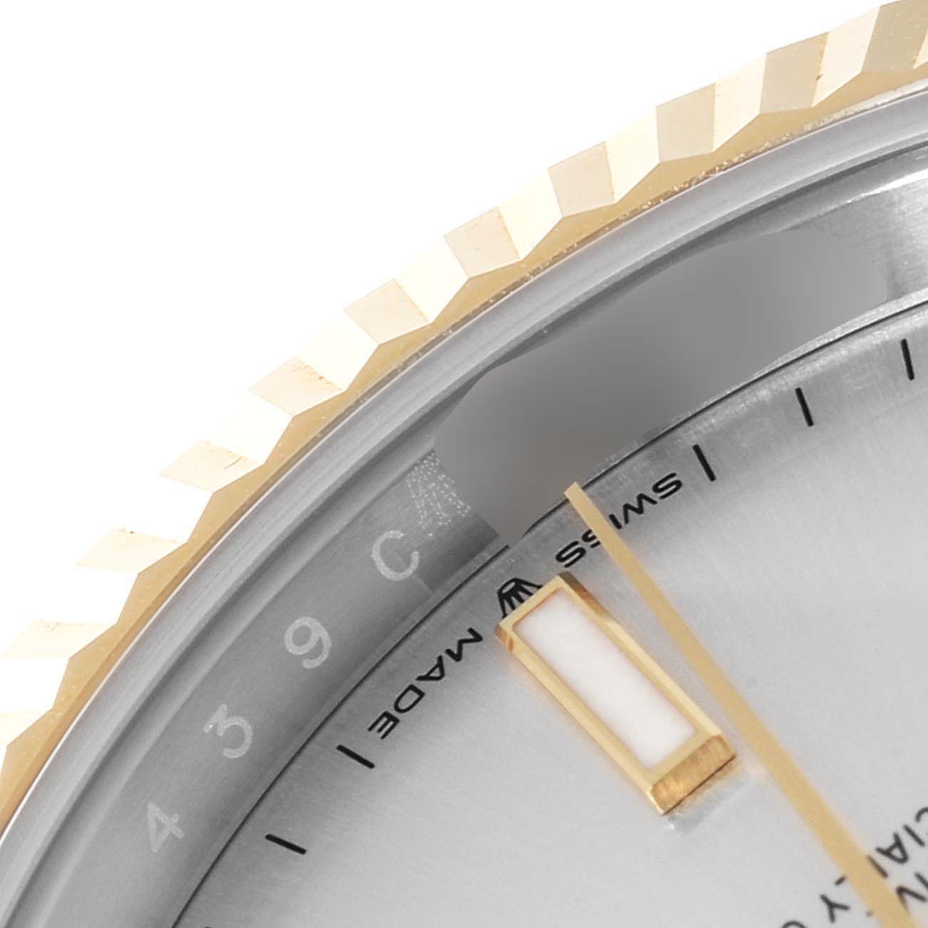 The image shows a close-up of the dial, flange, and fluted bezel of a Rolex Datejust 41 126333 Men's Steel and Gold (two tone) Silver Dial 126333 Men's Steel and Gold (two tone) Silver Dial watch.