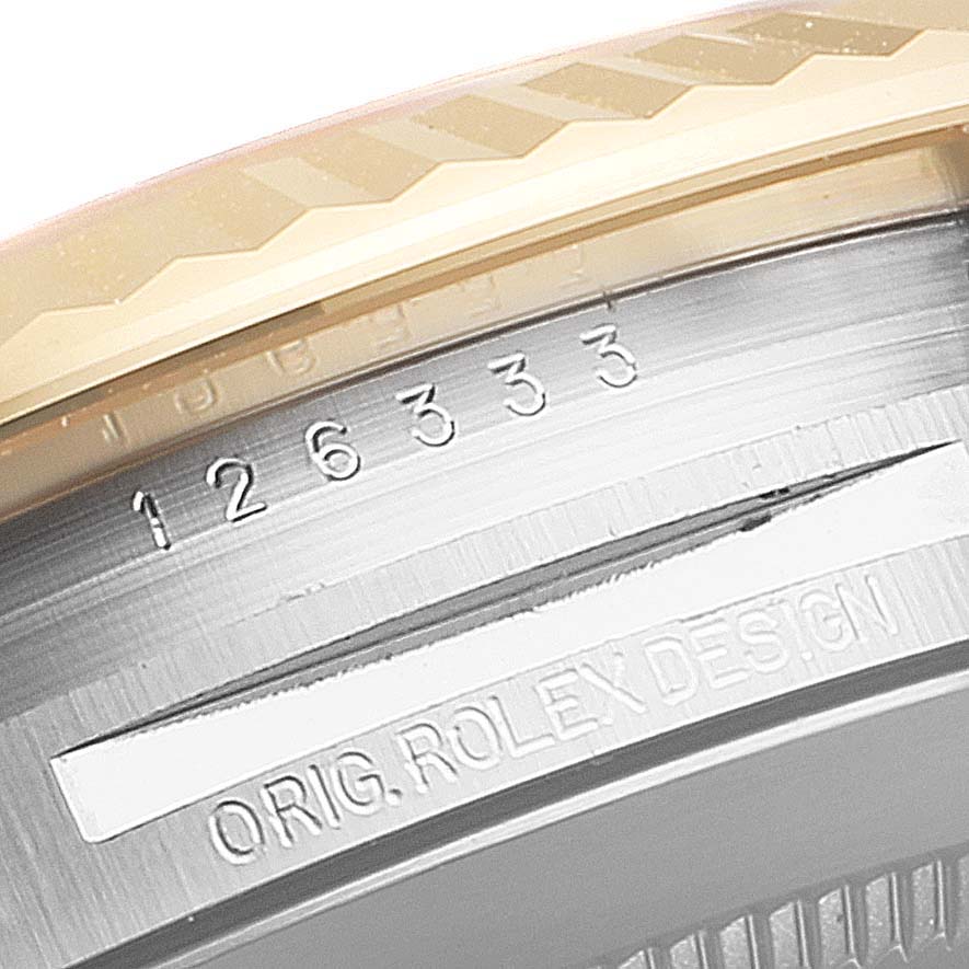 This image shows a close-up of the case side of a Rolex Datejust 41 126333 Men's Steel and Gold (two tone) Silver Dial 126333 Men's Steel and Gold (two tone) Silver Dial, highlighting the model number and "ORIG. ROLEX DESIGN" engraving.