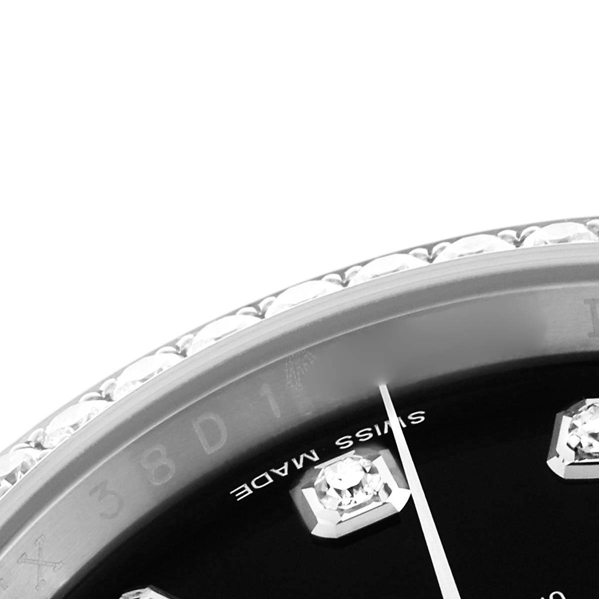The image shows a close-up of the Rolex Datejust 116244 Men
s Stainless Steel Black Dial 116244 Men
s Stainless Steel Black Dial
s diamond bezel and part of the dial, including diamond hour markers and "Swiss Made."