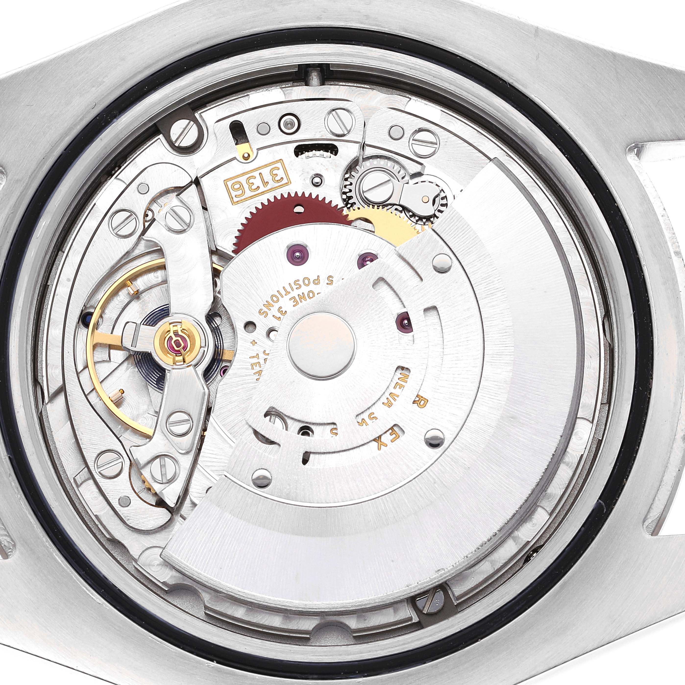 The image shows the inner mechanical movement of the Rolex Datejust 41 116334 Men's Stainless Steel Blue Dial 116334 Men's Stainless Steel Blue Dial, showcasing its intricate parts and gears.