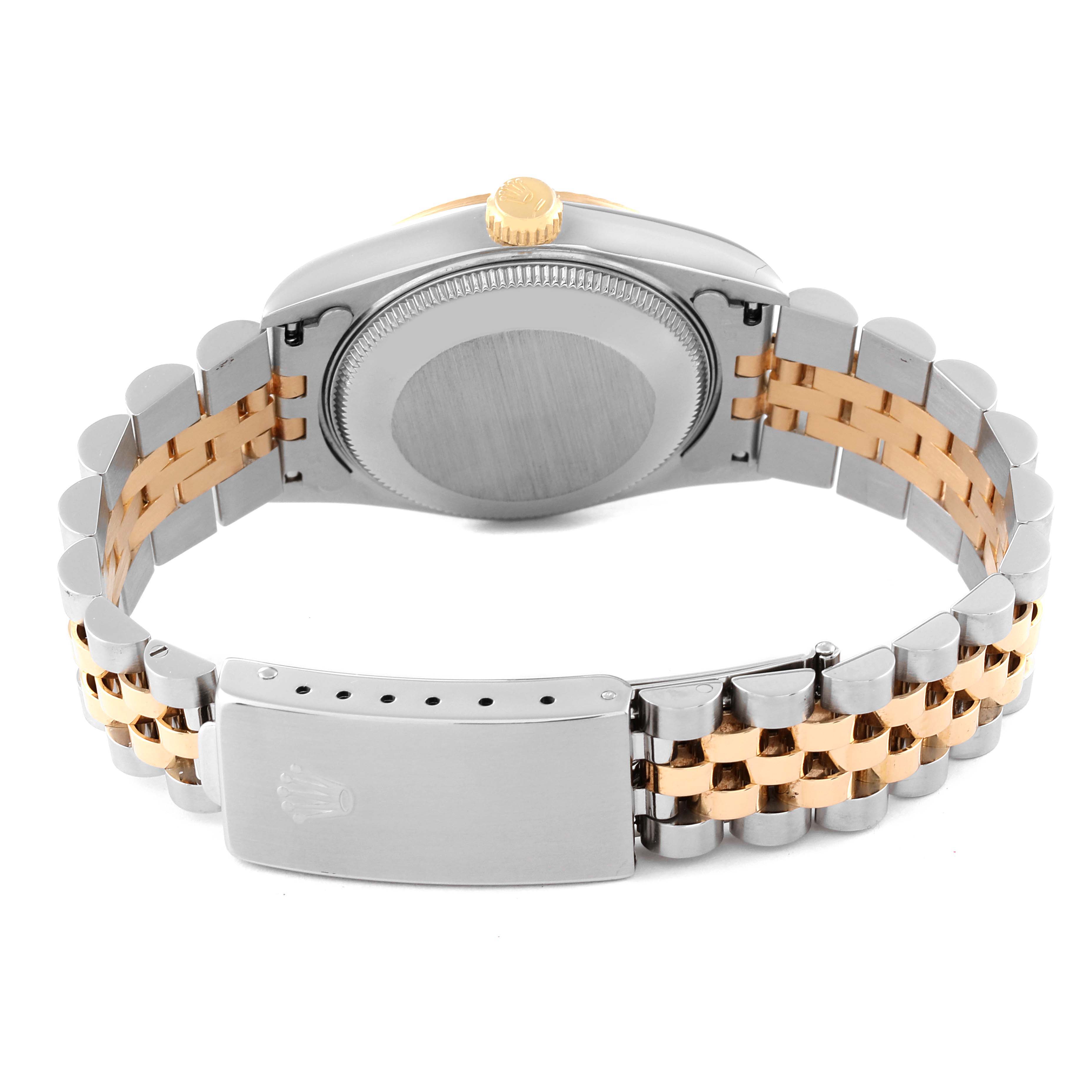 The image shows the back view of a Rolex Mid-Size 68273 Women's Steel and Gold (two tone) Champagne Dial 68273 Women's Steel and Gold (two tone) Champagne Dial watch, highlighting the case back, crown, and two-tone bracelet with clasp.