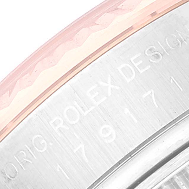 This image shows a close-up of the engraved edge and bezel of a Rolex Datejust 179171 Women's Steel and Gold (two tone) Silver Dial 179171 Women's Steel and Gold (two tone) Silver Dial watch.