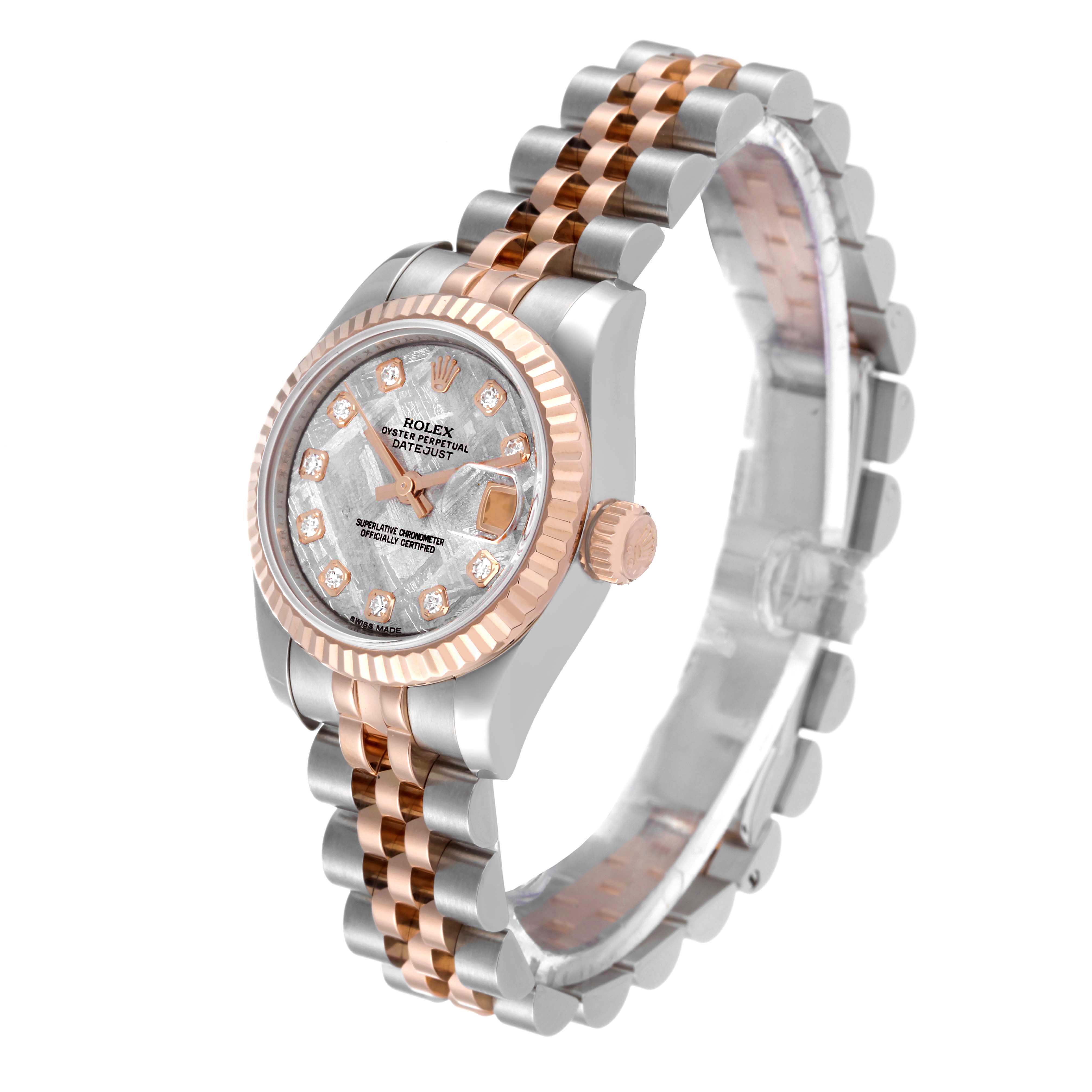 This image shows the Rolex Datejust 179171 Women's Steel and Gold (two tone) Silver Dial 179171 Women's Steel and Gold (two tone) Silver Dial watch from a three-quarter angle, highlighting the face, bezel, crown, and two-tone bracelet.