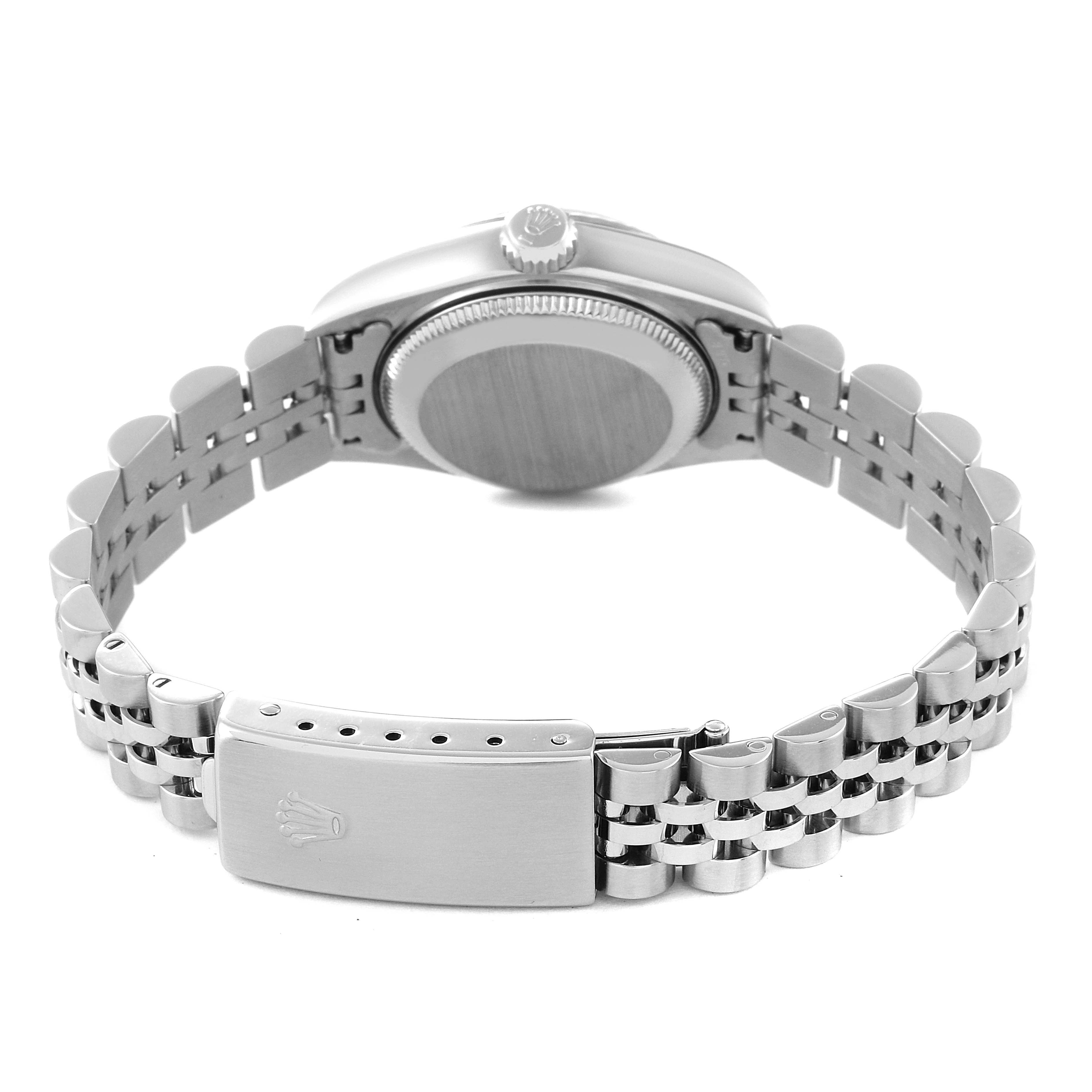 The image shows the back view of a Rolex Datejust 79174 Women's Steel and Gold (two tone) Mother of Pearl Dial 79174 Women's Steel and Gold (two tone) Mother of Pearl Dial watch, displaying the case back, crown, and deployment clasp on the bracelet.