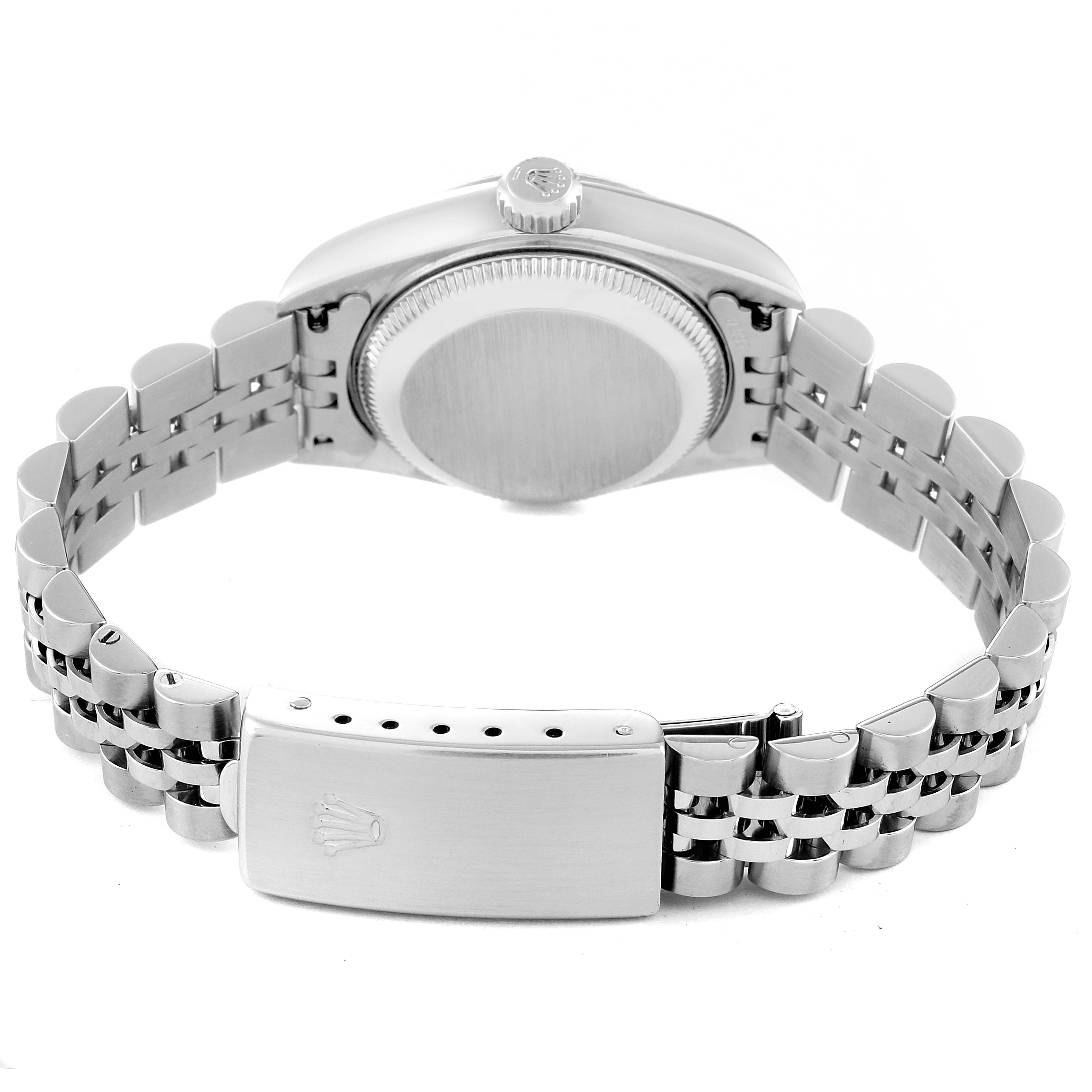 The image shows the back of a Rolex Datejust 79174 Women's Stainless Steel Mother of Pearl Dial 79174 Women's Stainless Steel Mother of Pearl Dial watch focusing on the case back, crown, and Jubilee bracelet with the clasp open.