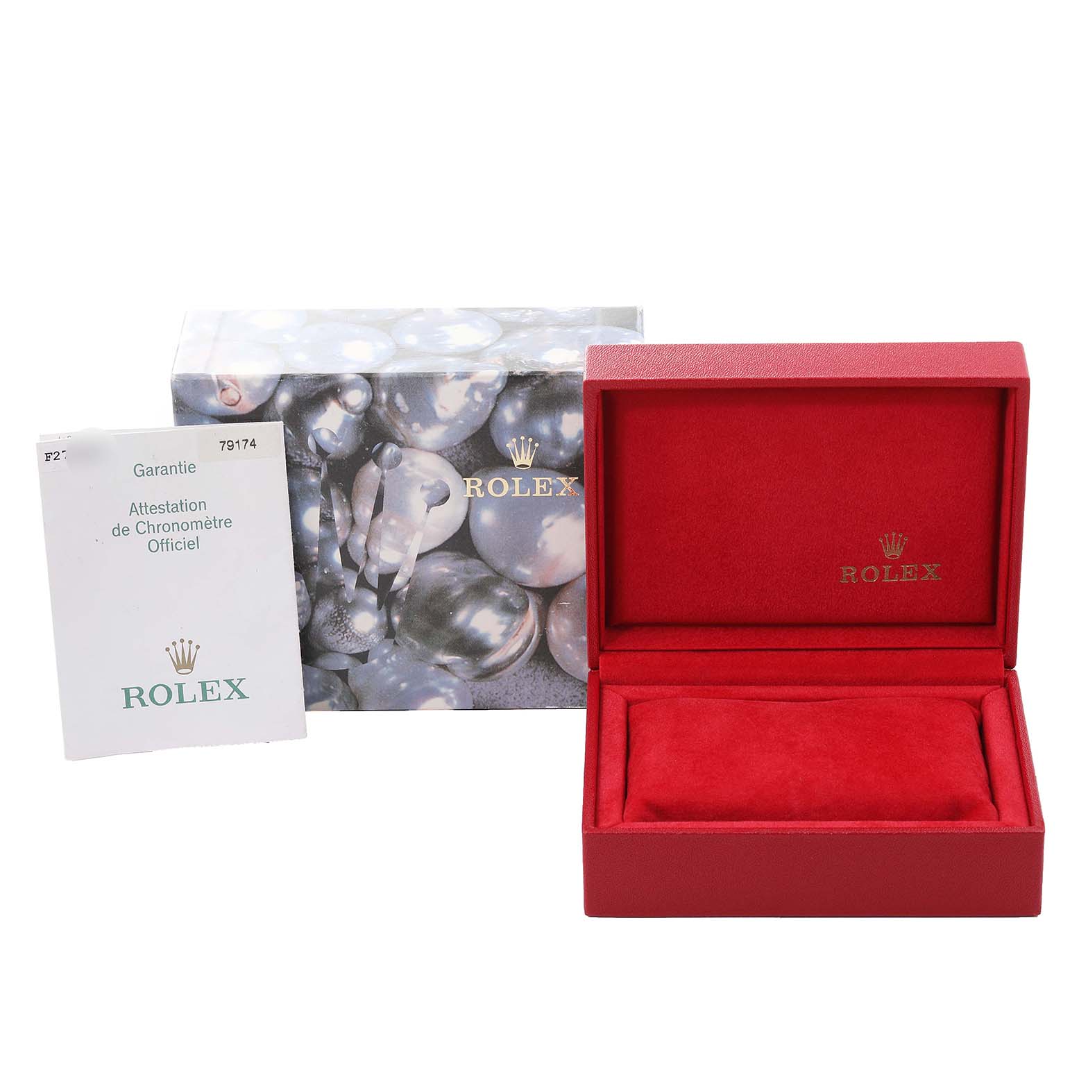 This image shows a Rolex Datejust 79174 Women's Stainless Steel Mother of Pearl Dial 79174 Women's Stainless Steel Mother of Pearl Dial box, a warranty card, and a red watch case.