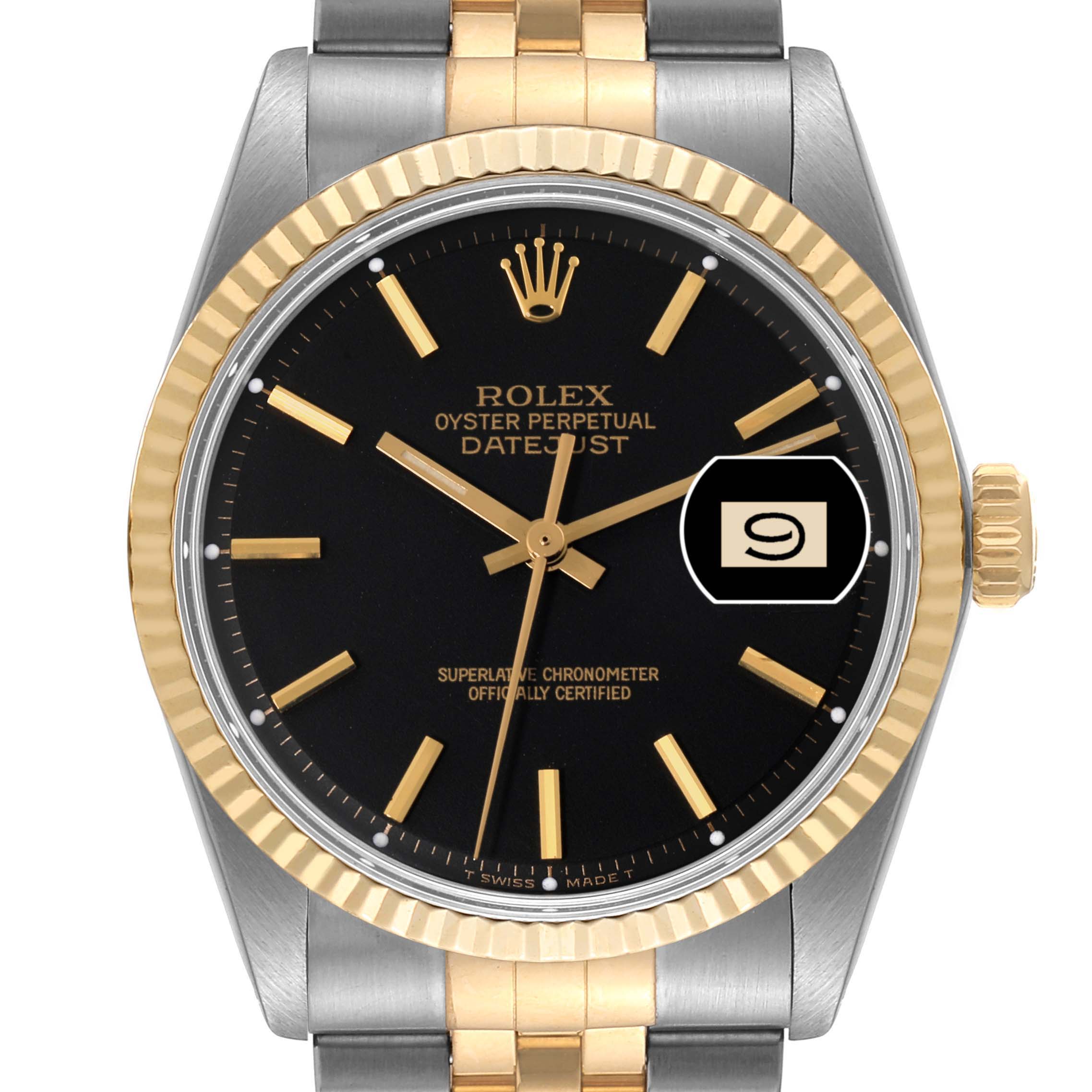 This Rolex Vintage Collection 1601 Men's Steel and Gold (two tone) Black Dial 1601 Men's Steel and Gold (two tone) Black Dial model shows the watch's face, bezel, crown, and part of the jubilee bracelet, viewed head-on.