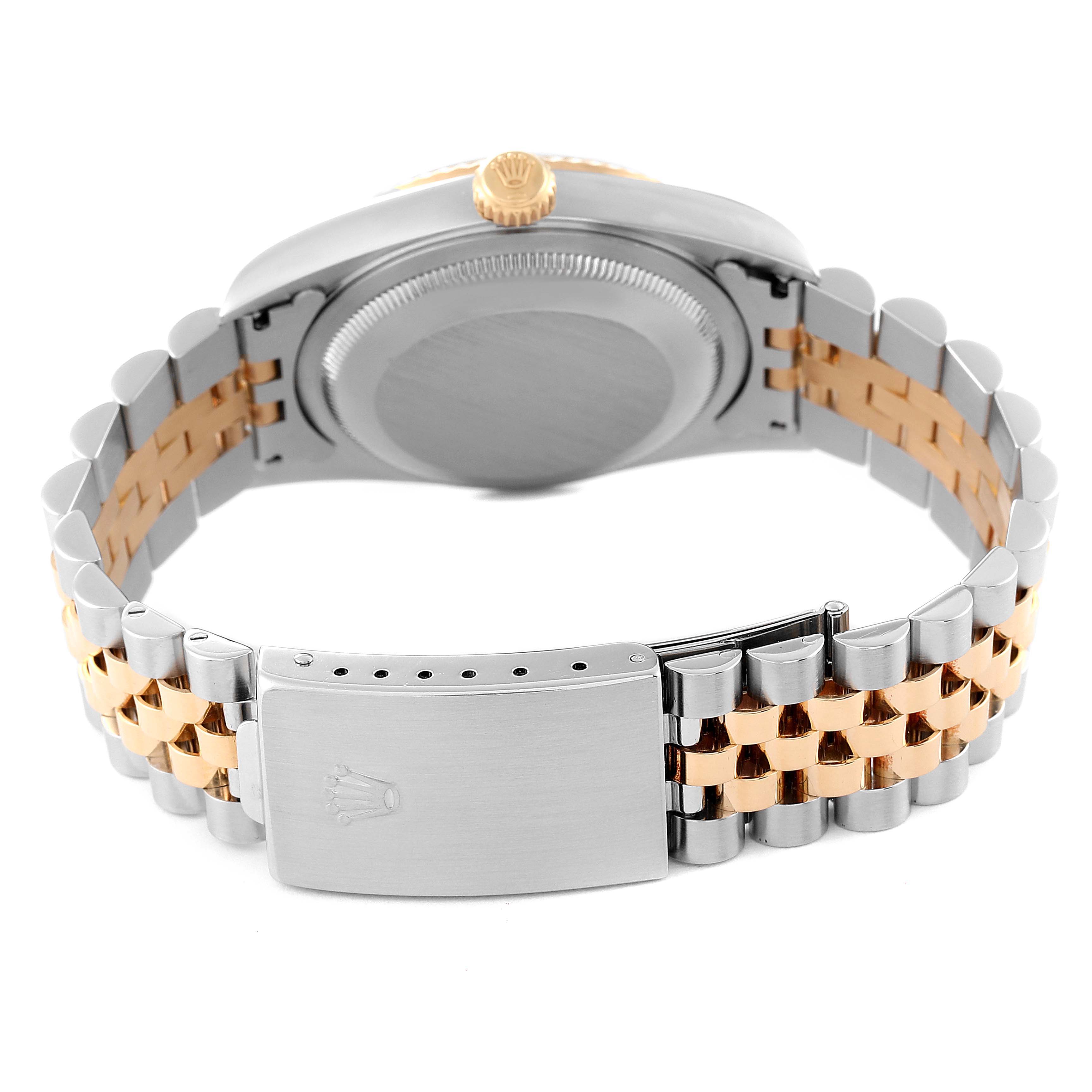 This image shows the back view of a Rolex Datejust 16233 Men's Steel and Gold (two tone) Black Dial 16233 Men's Steel and Gold (two tone) Black Dial watch, highlighting its clasp and bracelet.