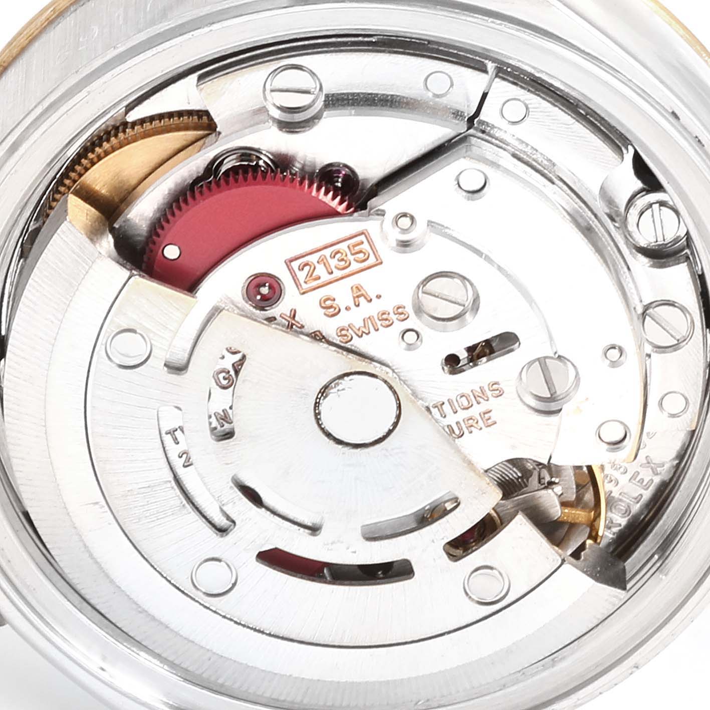 This image shows the internal mechanics of the Rolex Datejust 69173 Women
s Stainless Steel Blue Dial 69173 Women
s Stainless Steel Blue Dial watch movement, featuring the 2135 caliber.