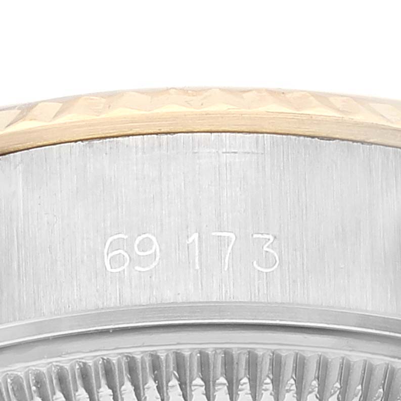 This image shows a close-up of the case side and bezel of the Rolex Datejust 69173 Women's Steel and Gold (two tone) Champagne Dial 69173 Women's Steel and Gold (two tone) Champagne Dial model watch with visible reference numbers "69173".