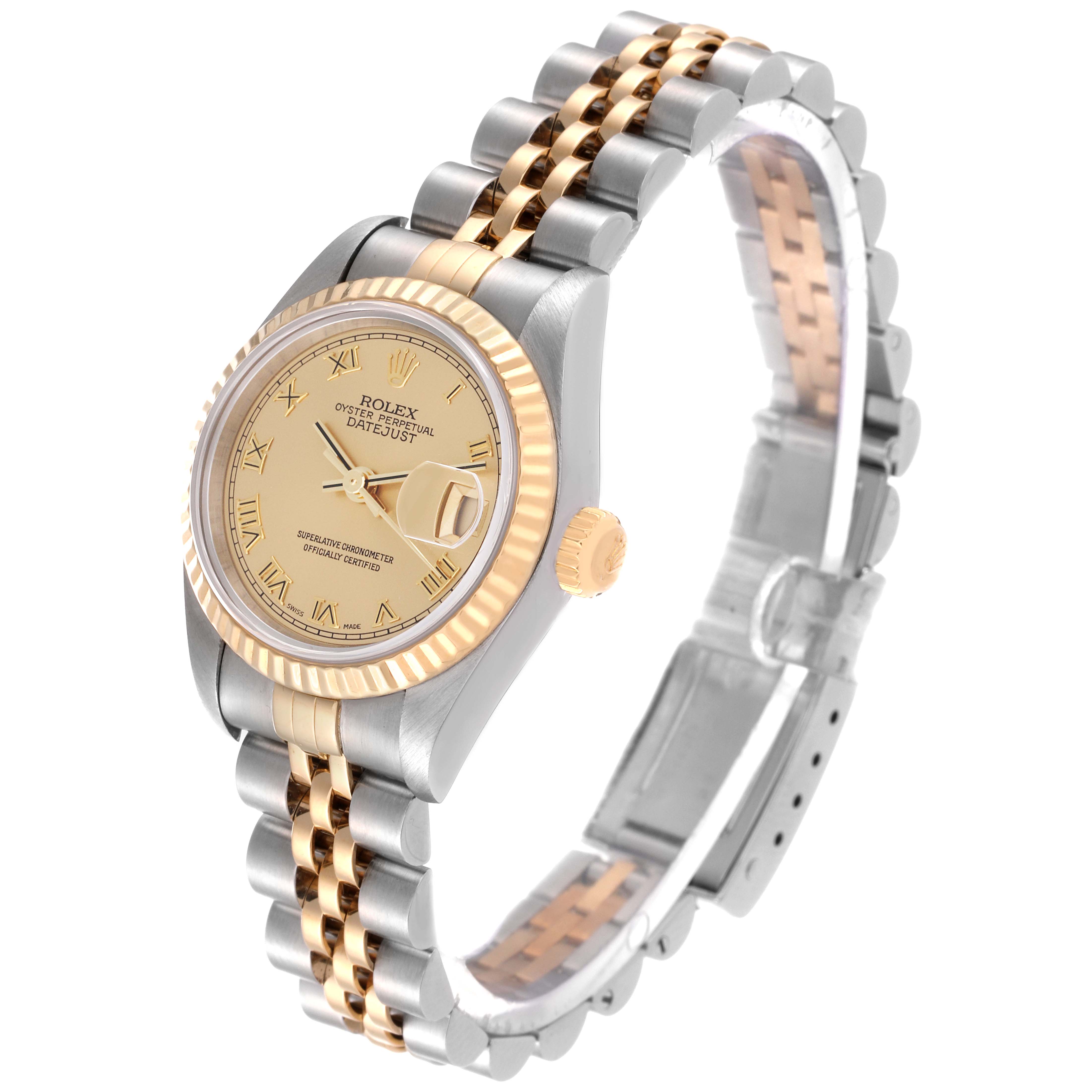 This image shows the Rolex Datejust 79173 Women's Steel and Gold (two tone) Champagne Dial 79173 Women's Steel and Gold (two tone) Champagne Dial watch at an angle highlighting its gold and silver-colored band and face with a date display.