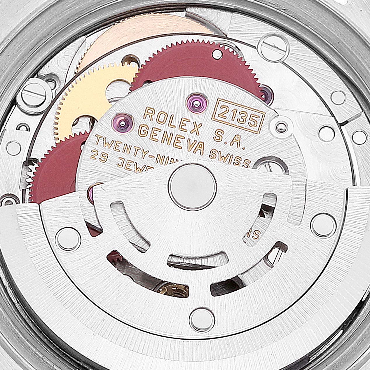 This is a close-up view of the movement inside a Rolex Datejust 69173 Women's Steel and Gold (two tone) Beige Dial 69173 Women's Steel and Gold (two tone) Beige Dial model, showcasing its intricate gears and components.
