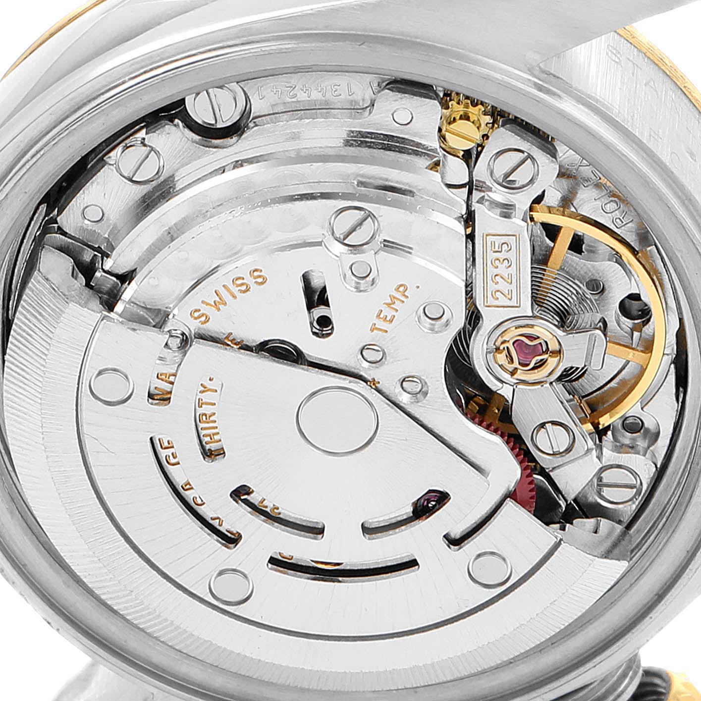 The image shows the internal mechanism of a Rolex Datejust 79173 Women's Steel and Gold (two tone) Champagne Dial 79173 Women's Steel and Gold (two tone) Champagne Dial watch at a slight diagonal angle.