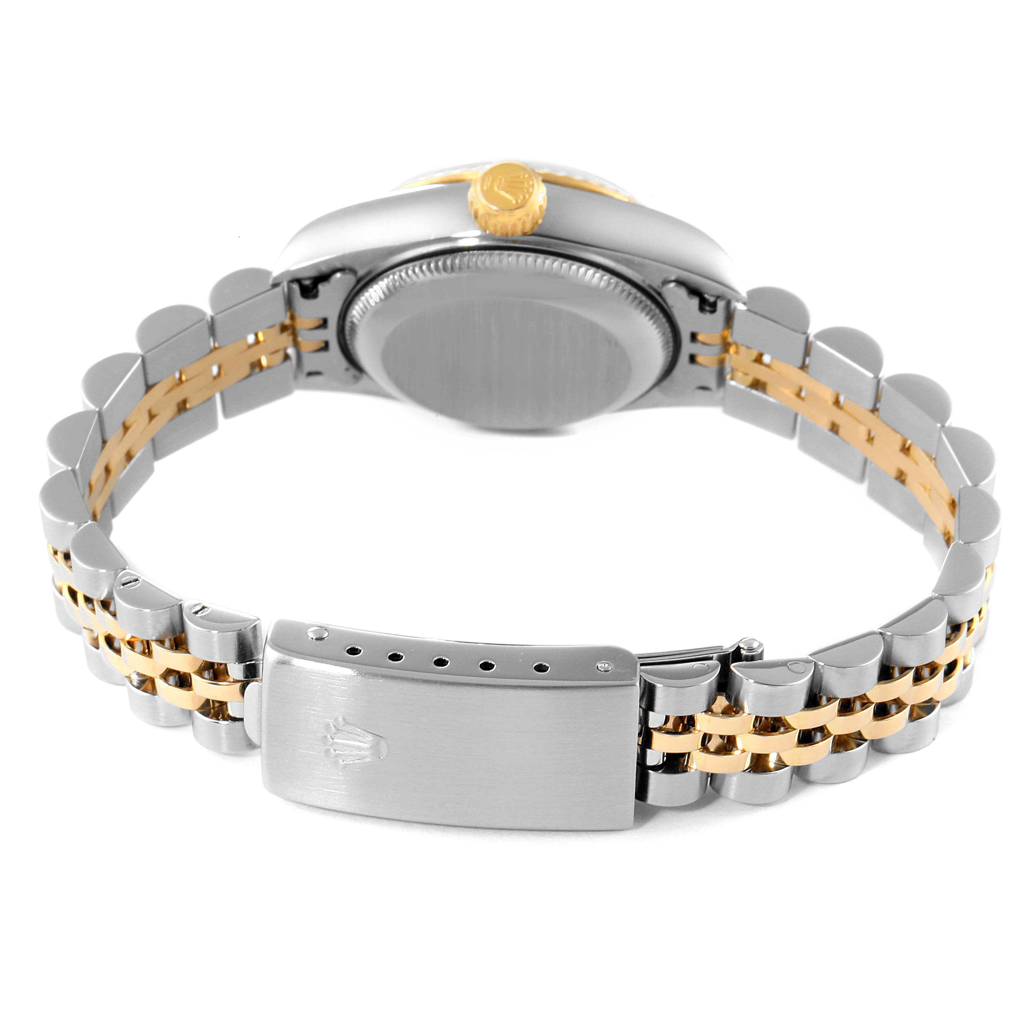 The image shows the back view of a Rolex Datejust 79173 Women's Steel and Gold (two tone) Champagne Dial 79173 Women's Steel and Gold (two tone) Champagne Dial watch highlighting the clasp, bracelet, and case back.