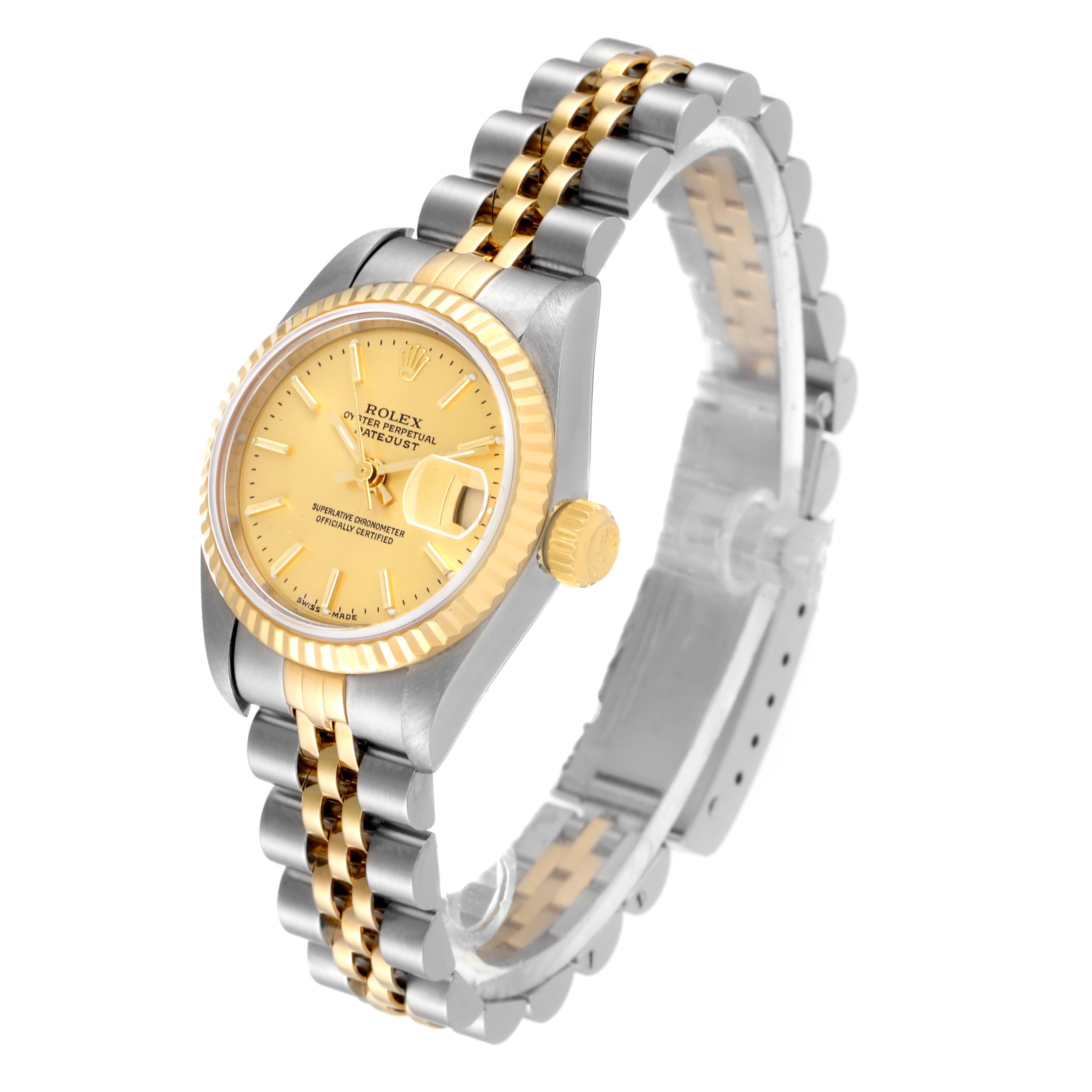This Rolex Datejust 79173 Women's Steel and Gold (two tone) Champagne Dial 79173 Women's Steel and Gold (two tone) Champagne Dial watch is shown in a three-quarter angle, displaying the face, bezel, and bracelet.