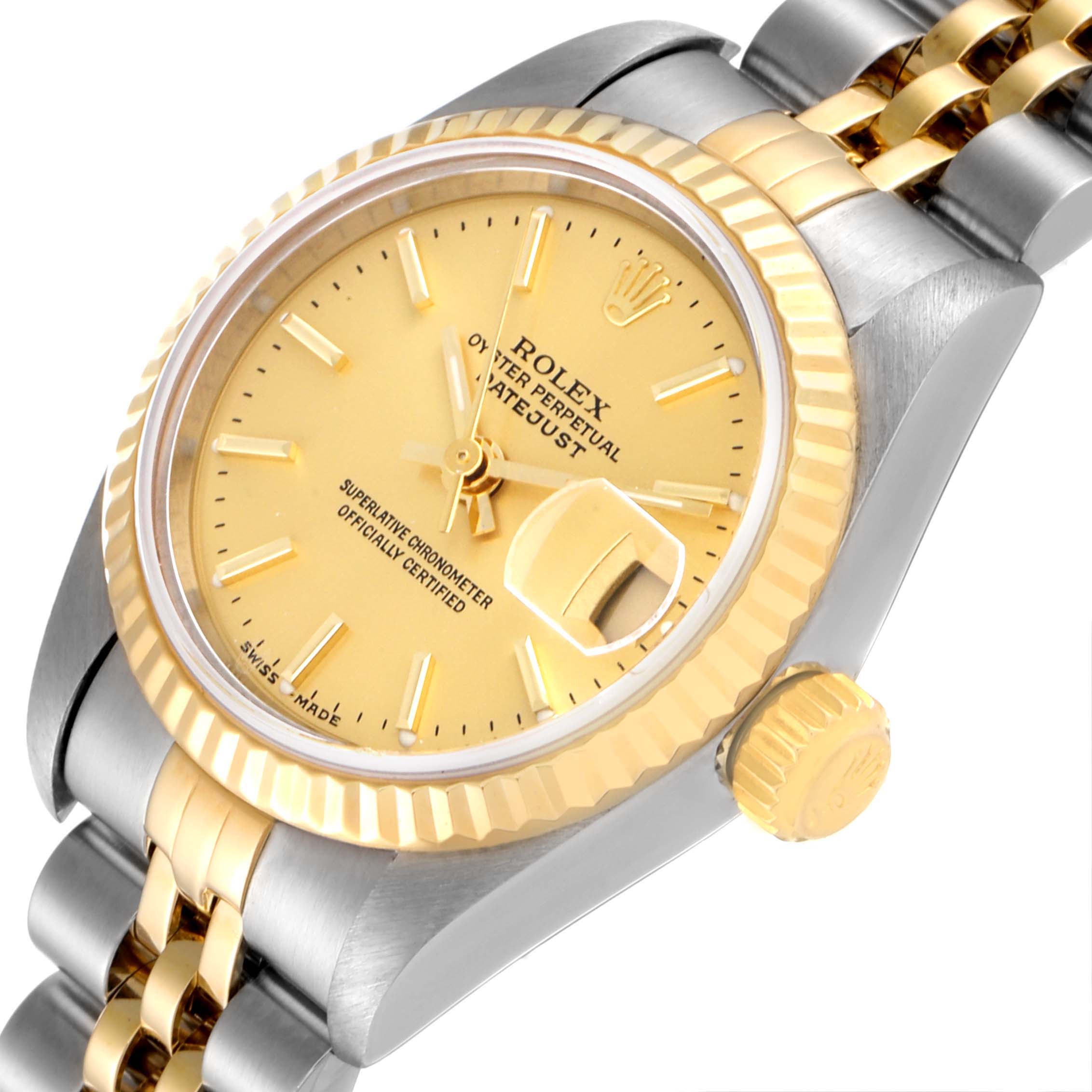 This image shows a Rolex Datejust 79173 Women's Steel and Gold (two tone) Champagne Dial 79173 Women's Steel and Gold (two tone) Champagne Dial watch at an angled view, highlighting the dial, bezel, crown, and part of the bracelet.