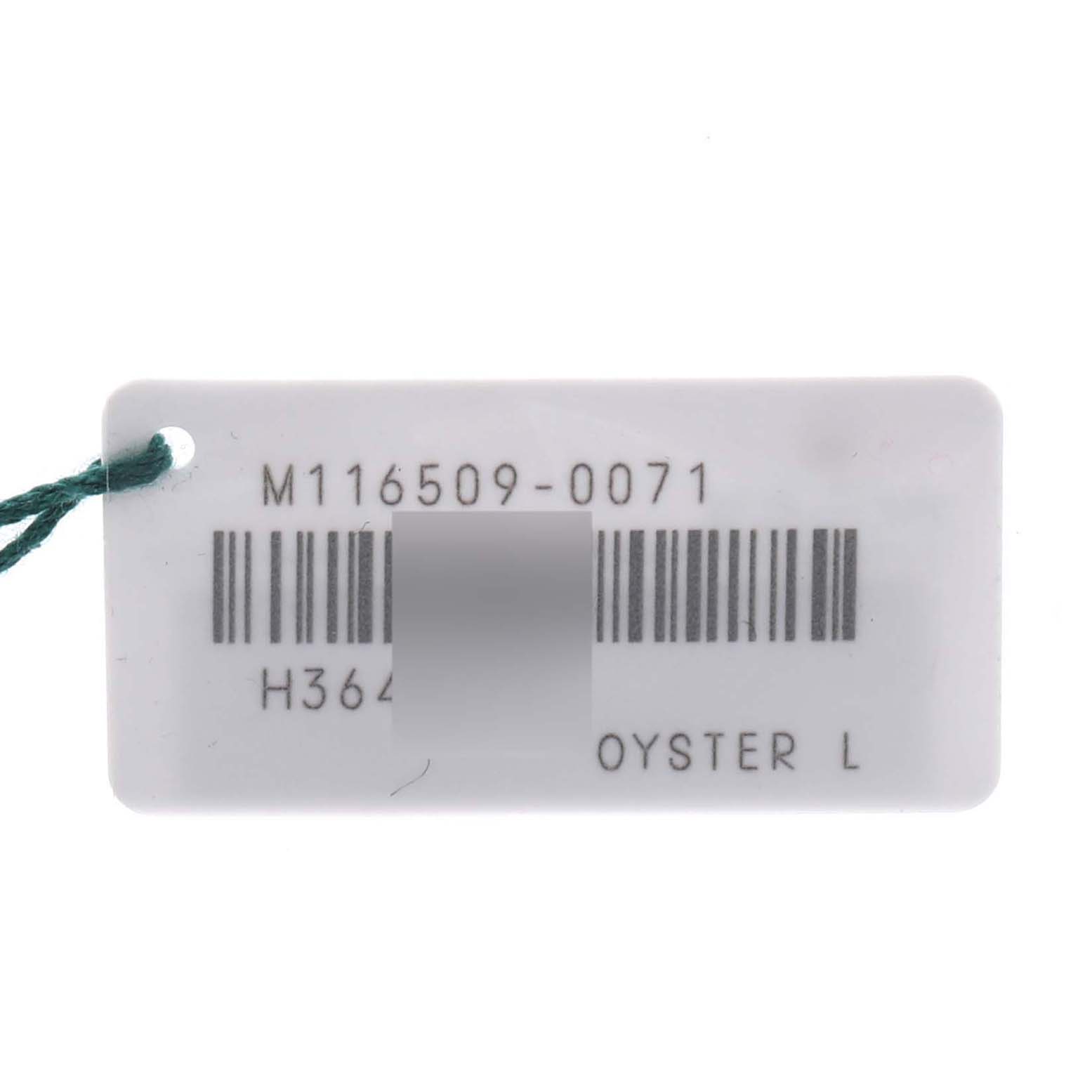 The image shows a tag with a barcode and model number for a Rolex Daytona 116509 Men's White Gold Blue Dial 116509 Men's White Gold Blue Dial watch, but does not show the watch itself.