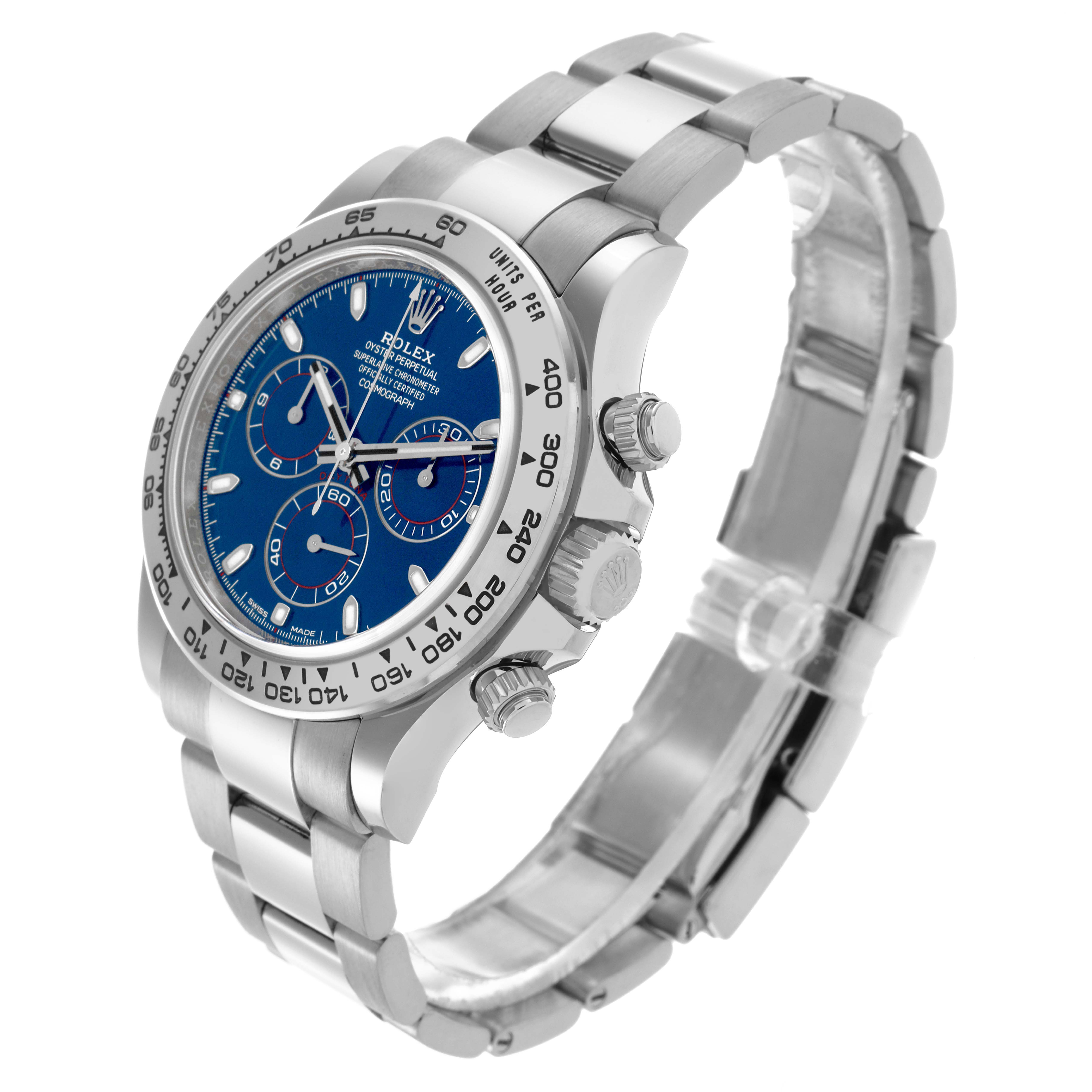 The Rolex Daytona 116509 Men's White Gold Blue Dial 116509 Men's White Gold Blue Dial watch is shown at a three-quarter angle, displaying its face, side pushers, and metal bracelet.