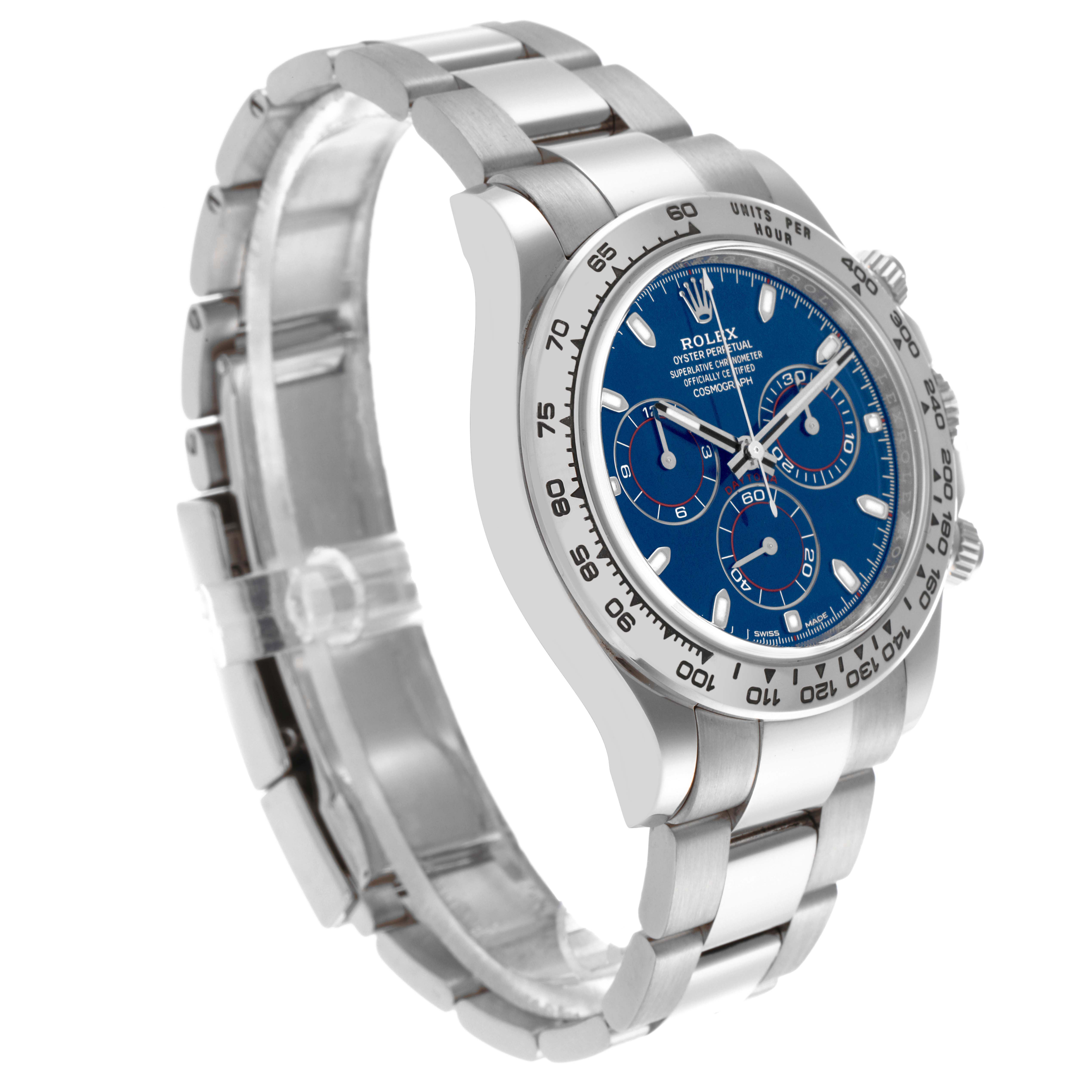 The Rolex Daytona 116509 Men's White Gold Blue Dial 116509 Men's White Gold Blue Dial watch is shown at a three-quarter angle, highlighting its face, bezel, and part of the bracelet.