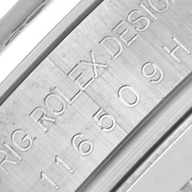 The image shows the inner bezel and engraved model number of a Rolex Daytona 116509 Men's White Gold Blue Dial 116509 Men's White Gold Blue Dial watch.