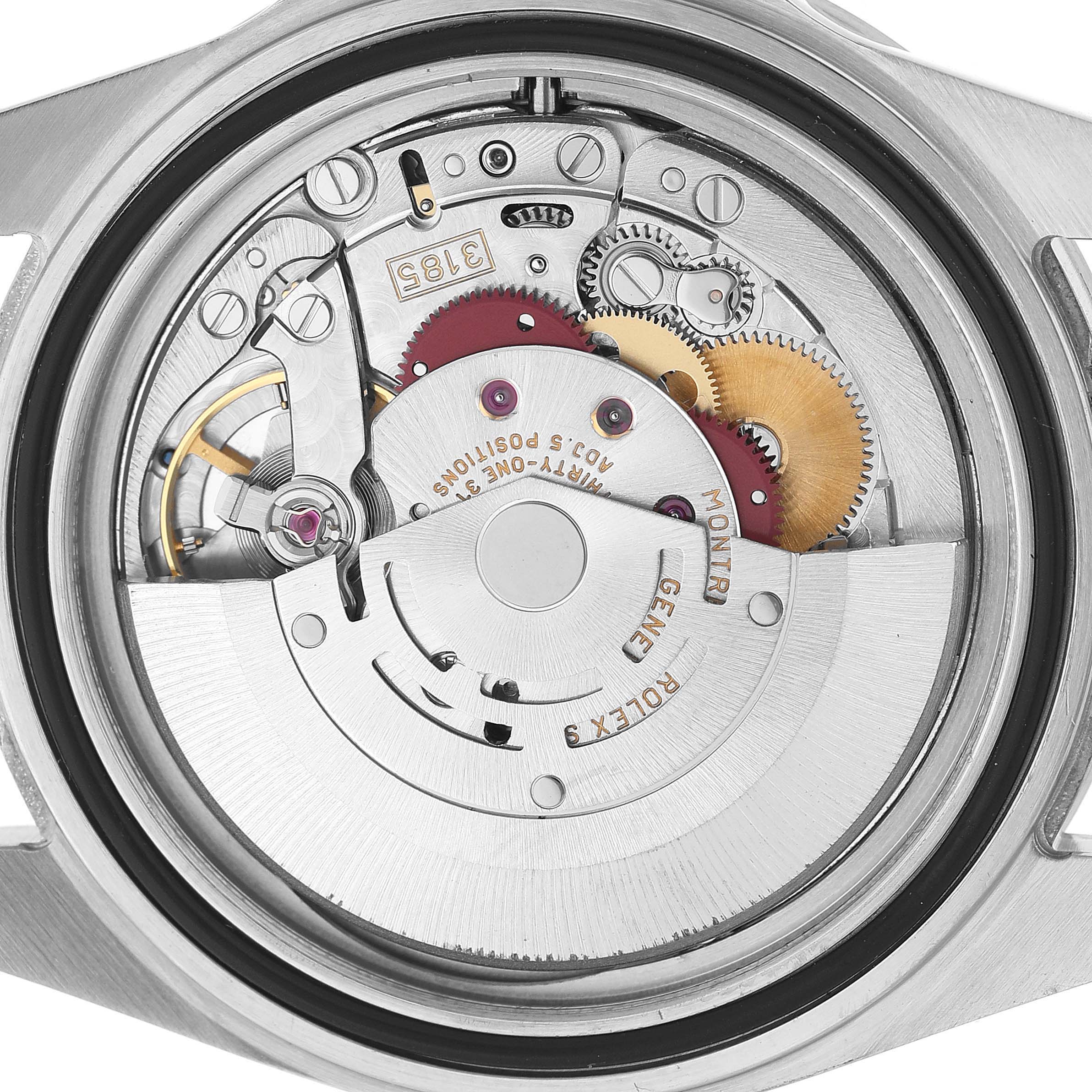 The image shows the movement of a Rolex Explorer 16570 Men's Stainless Steel White Dial, detailing gears and internal components from a back view.