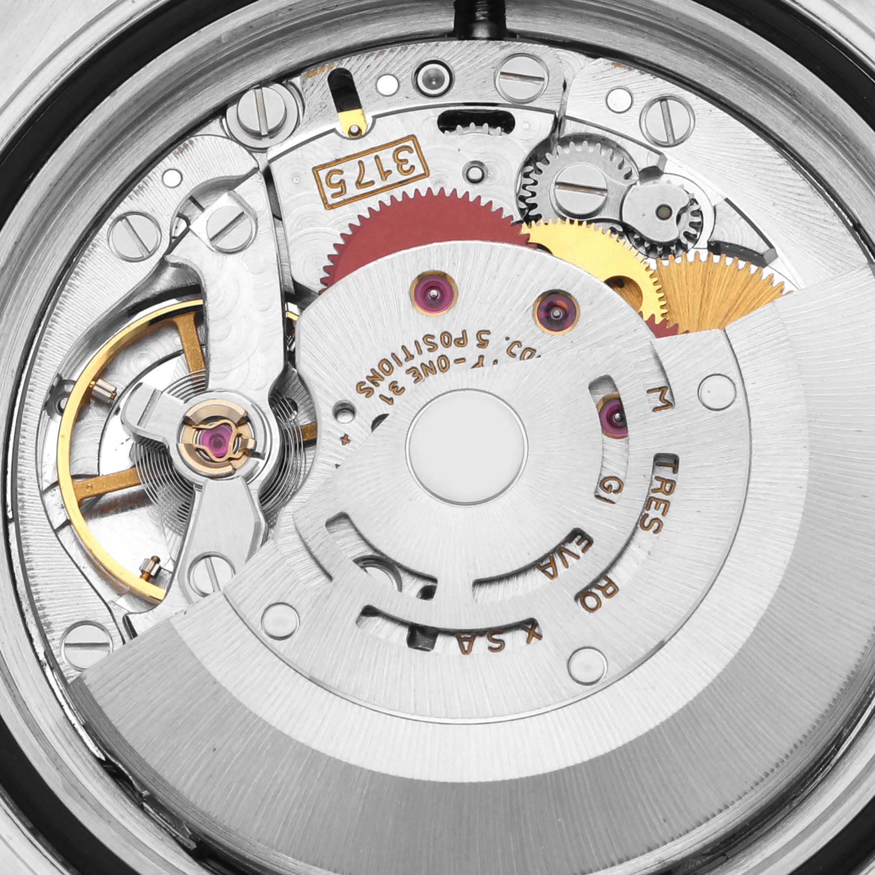 The image shows a close-up of the movement of a Rolex GMT-Master 16700 Men's Stainless Steel Black Dial 16700 Men's Stainless Steel Black Dial watch, highlighting gears and other internal components.