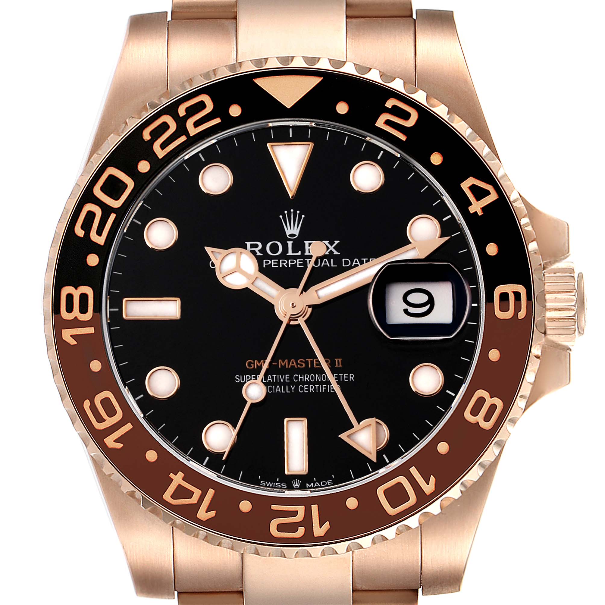 The image shows a close-up of the dial and bezel of a Rolex GMT-Master 126715CHNR Men
s Rose Gold Black Dial 126715CHNR Men
s Rose Gold Black Dial II watch, highlighting the face, hands, and crown.