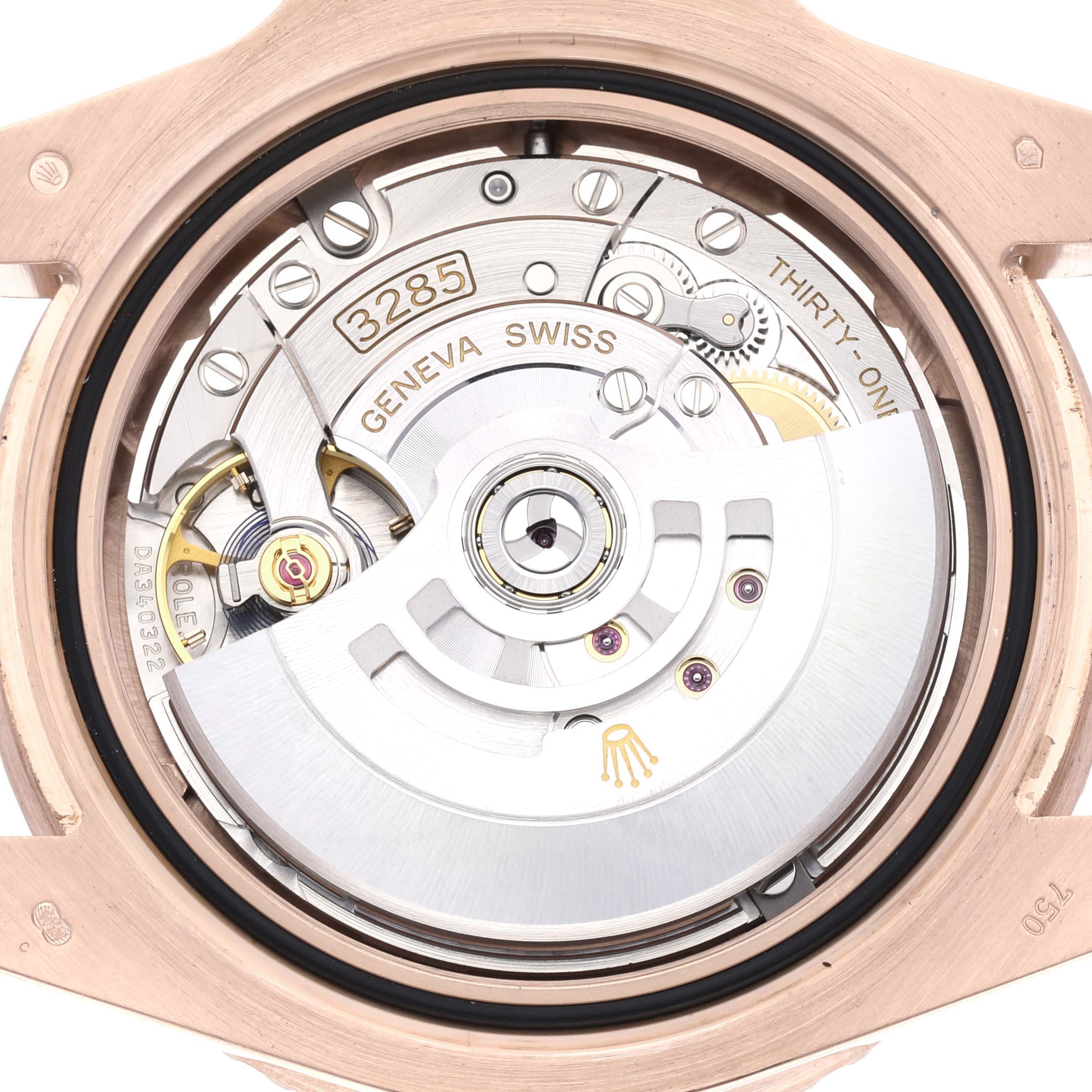 This image shows the movement mechanism of a Rolex GMT-Master 126715CHNR Men
s Rose Gold Black Dial 126715CHNR Men
s Rose Gold Black Dial watch from a back angle.