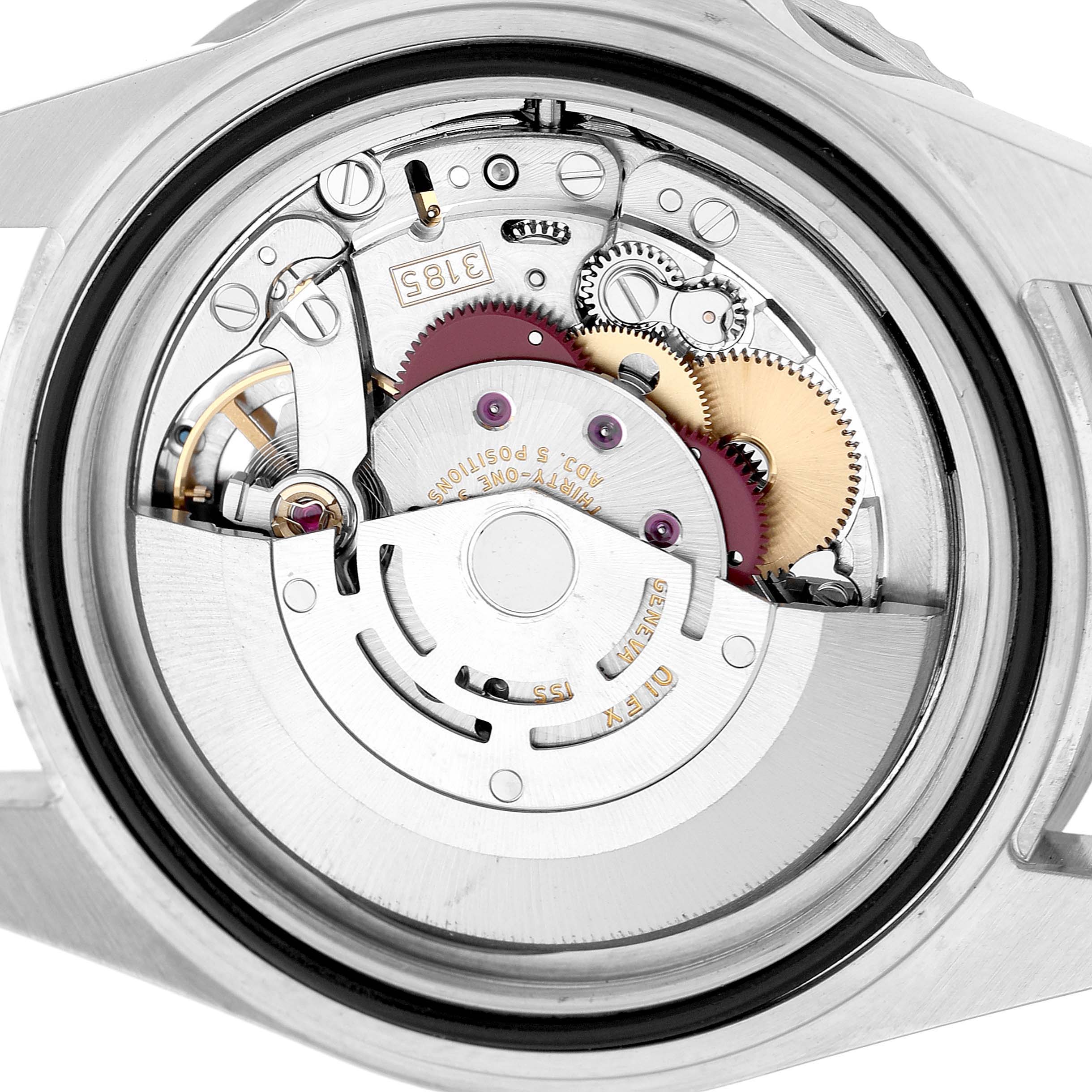 The image shows the movement of a Rolex GMT-Master 16710 Men's Stainless Steel Black Dial watch from a back angle, highlighting gears and components.