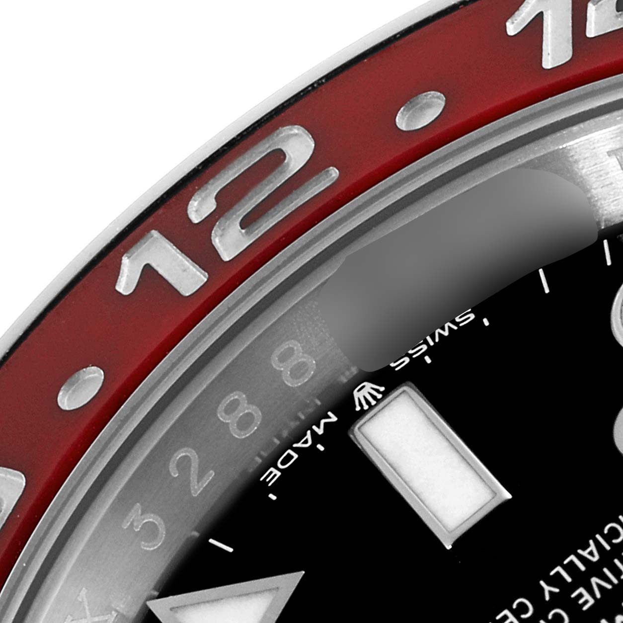 The image shows a close-up of the bezel and part of the dial of the Rolex GMT-Master 126710BLRO Men
s Stainless Steel Black Dial 126710BLRO Men
s Stainless Steel Black Dial watch.