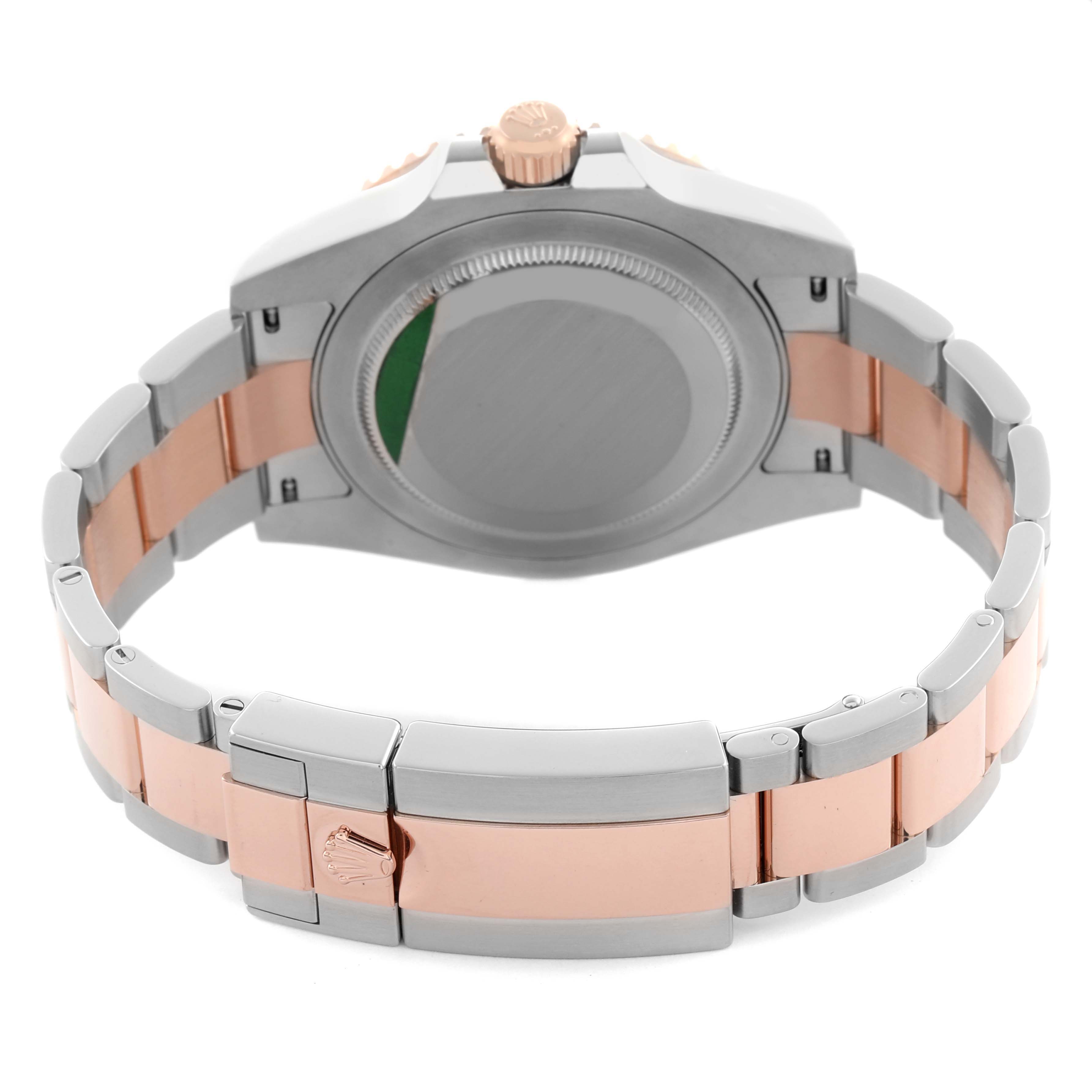 The image shows the back and side view of the Rolex GMT-Master 126711CHNR Men's Steel and Gold (two tone) Black Dial 126711CHNR Men's Steel and Gold (two tone) Black Dial, highlighting its case back, crown, and bracelet.