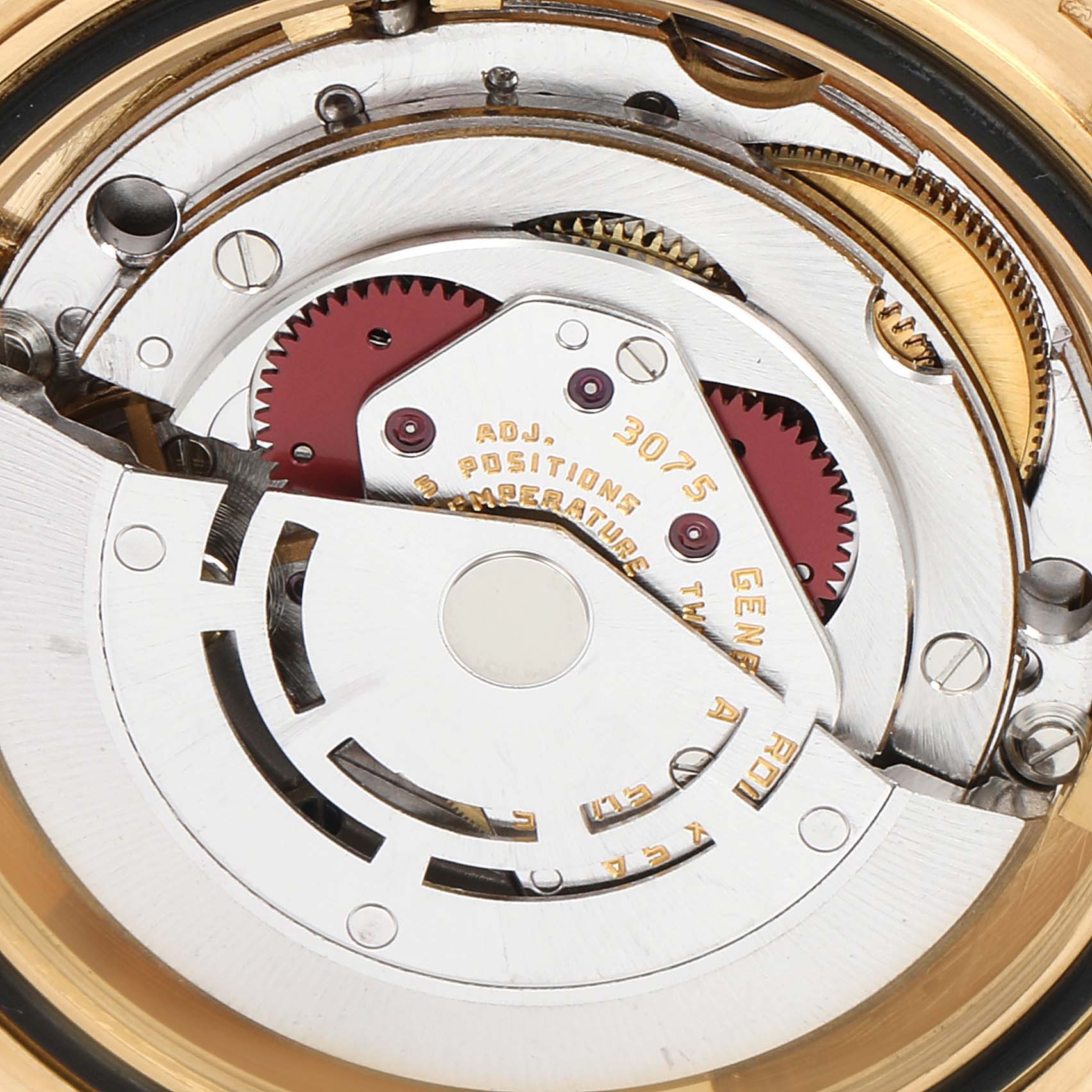This image shows the intricate internal movement and mechanism of a Rolex GMT-Master 16758 Men's Yellow Gold Brown Dial 16758 Men's Yellow Gold Brown Dial watch.