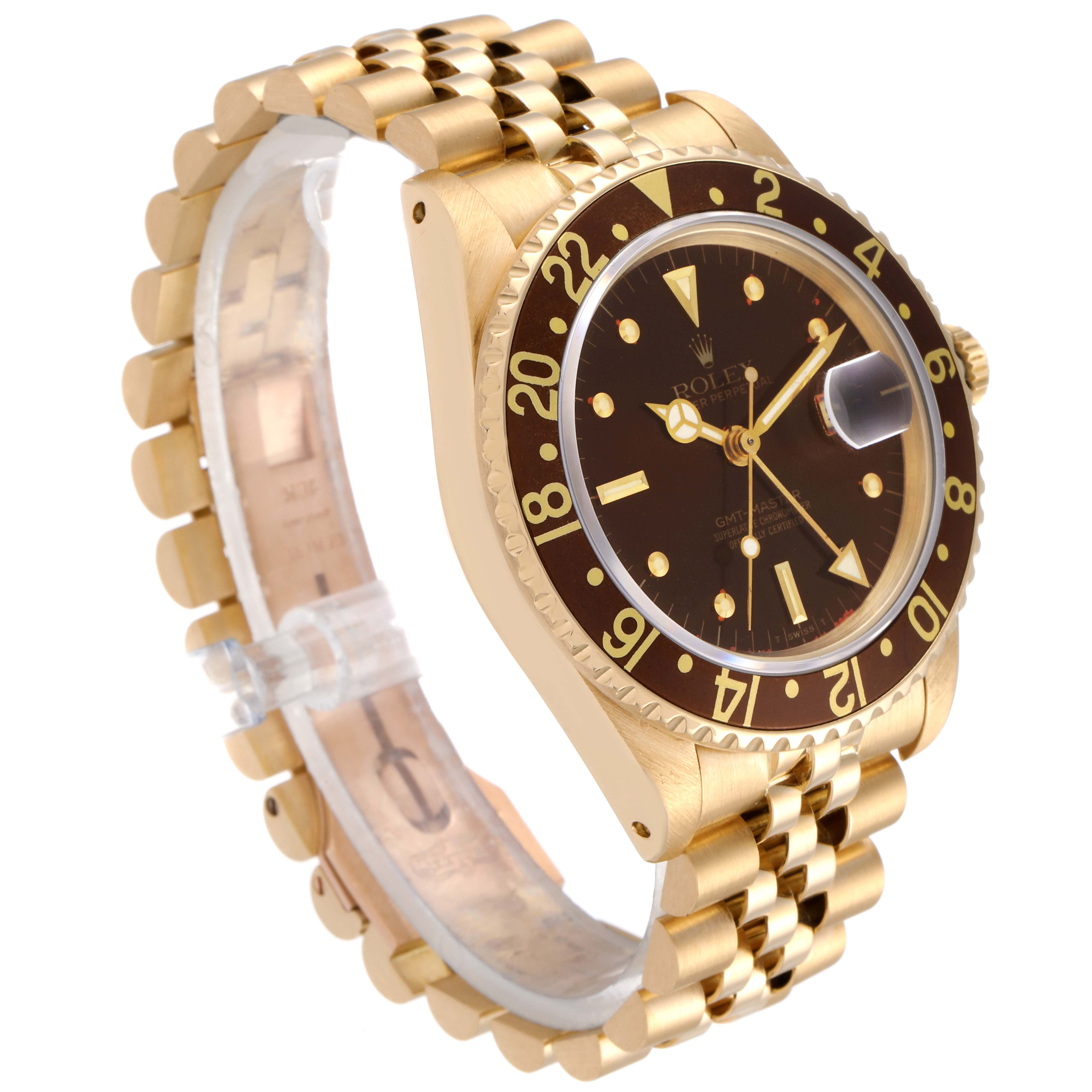 The Rolex GMT-Master 16758 Men's Yellow Gold Brown Dial 16758 Men's Yellow Gold Brown Dial watch is shown at a three-quarter angle, highlighting the gold bracelet, bezel, crown, and dial.