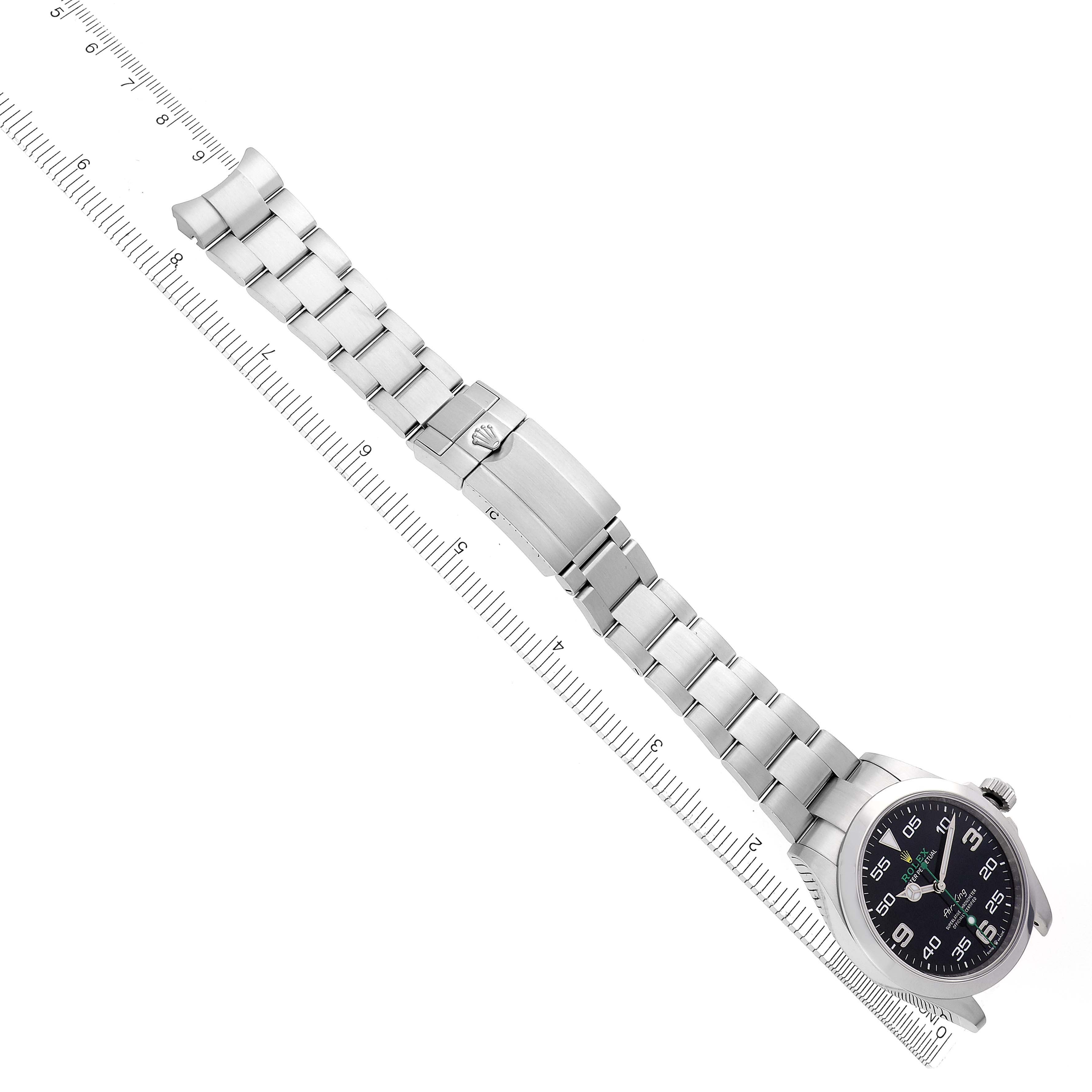 The Rolex Air-King 126900 Men's Stainless Steel Black Dial 126900 Men's Stainless Steel Black Dial watch is shown from an angled top view, displaying the full metal bracelet, clasp, and dial.