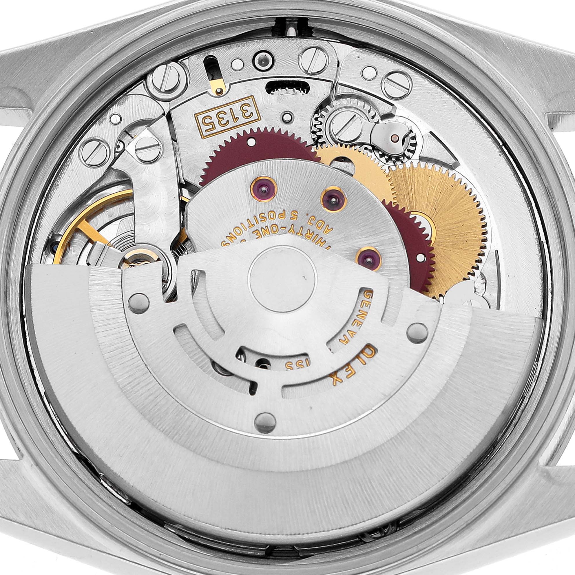The image shows the back view of the Rolex Date 15200 Men's Stainless Steel Silver Dial model's movement, highlighting gears and the rotor.