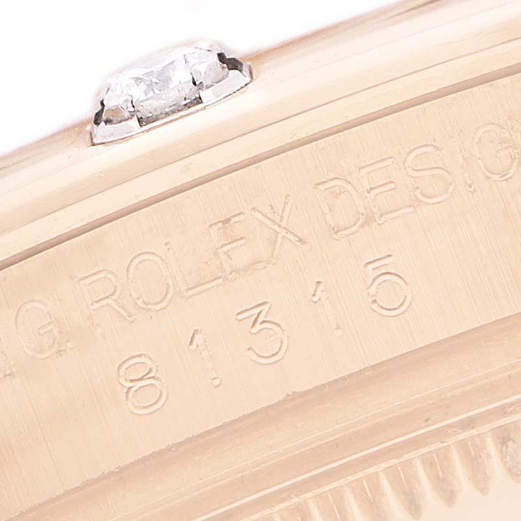 The image shows a close-up of the Rolex Pearlmaster 81315 Women's Rose Gold Mother of Pearl Dial's engraved case side, including a diamond detail.