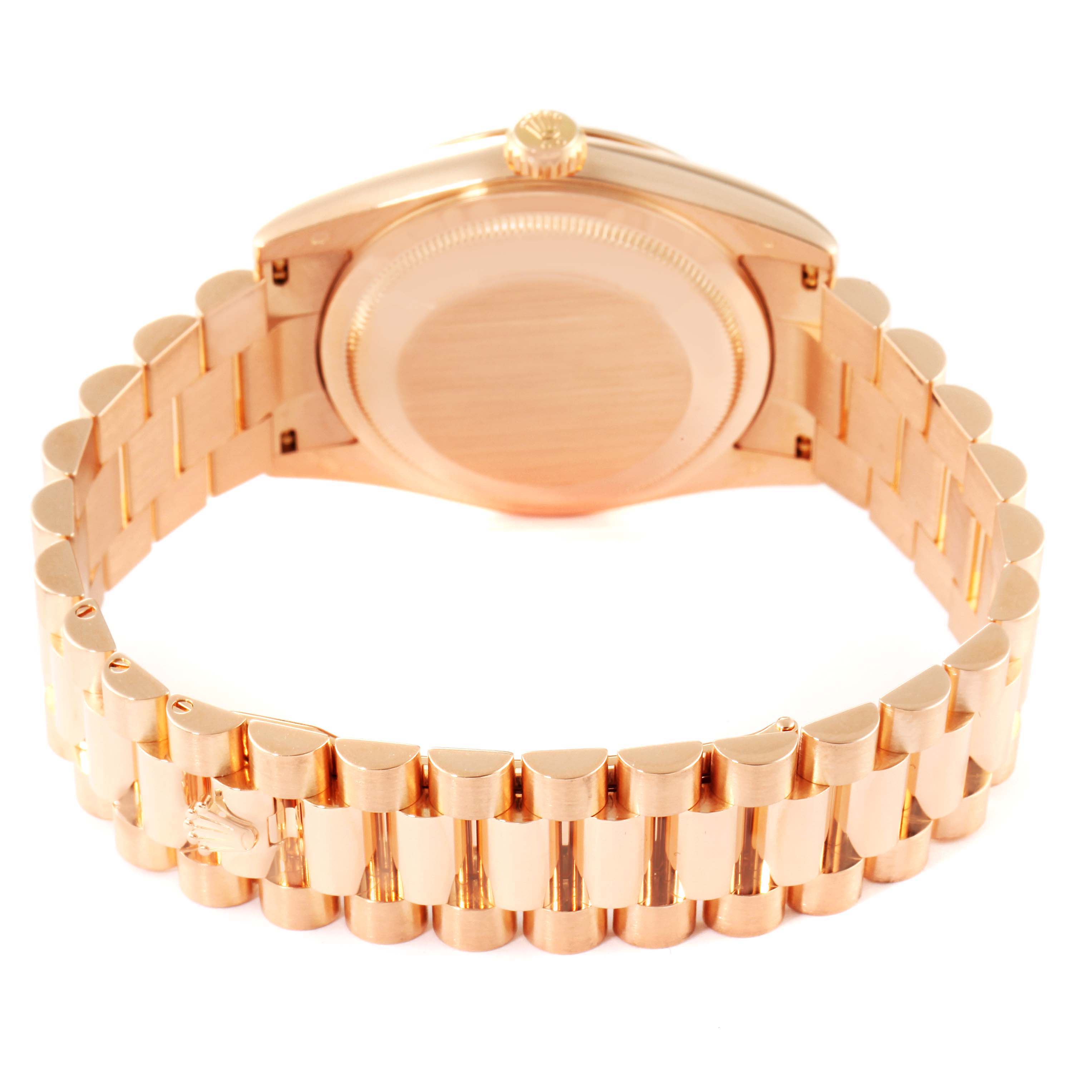 This image shows the back view of the Rolex President 118235 Men's Rose Gold Pink Dial 118235 Men's Rose Gold Pink Dial model watch, highlighting its closed case back and gold bracelet.