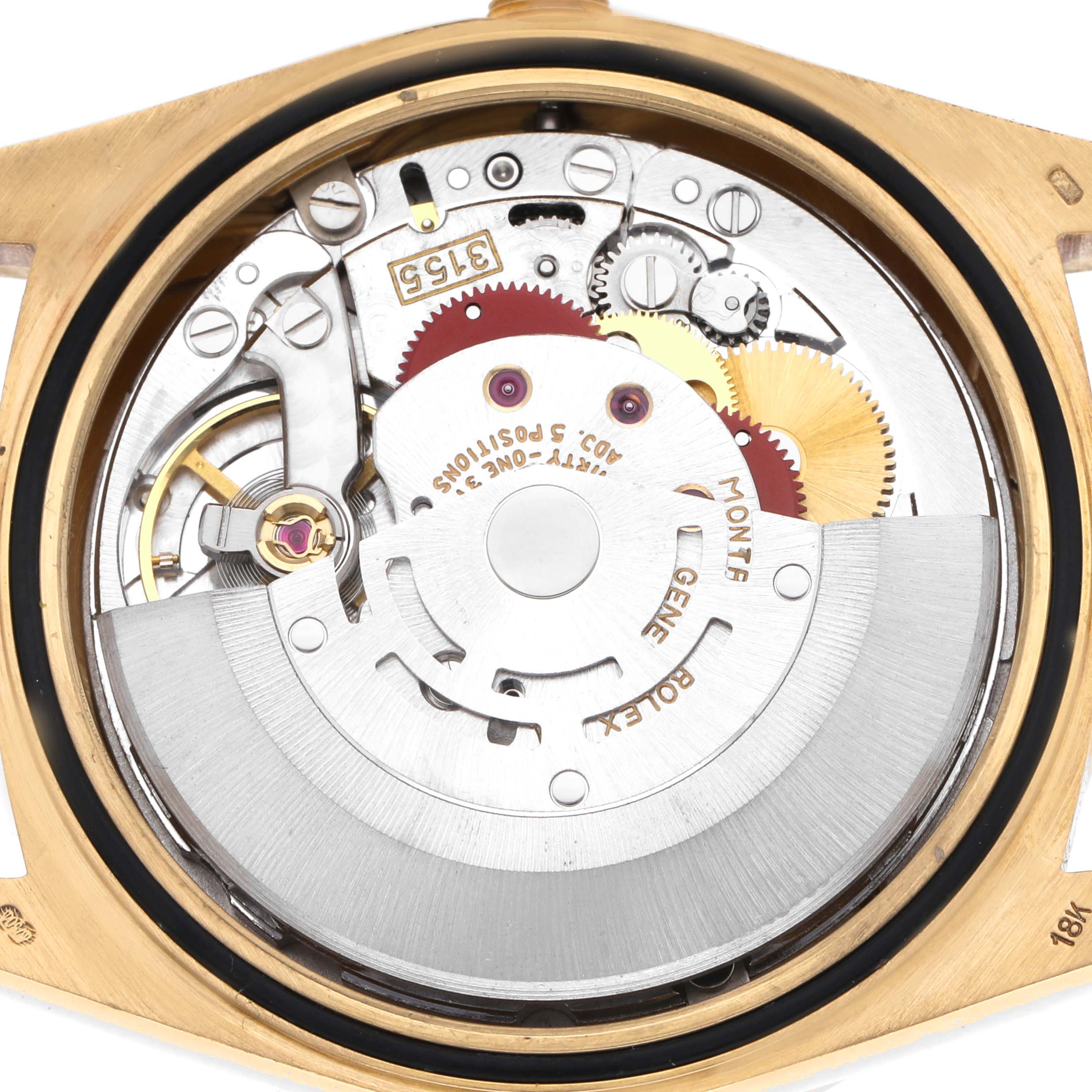 The image shows the movement of a Rolex President 18348 Men's Yellow Gold Champagne Dial 18348 Men's Yellow Gold Champagne Dial watch from a direct top-down angle, displaying its intricate mechanical parts.