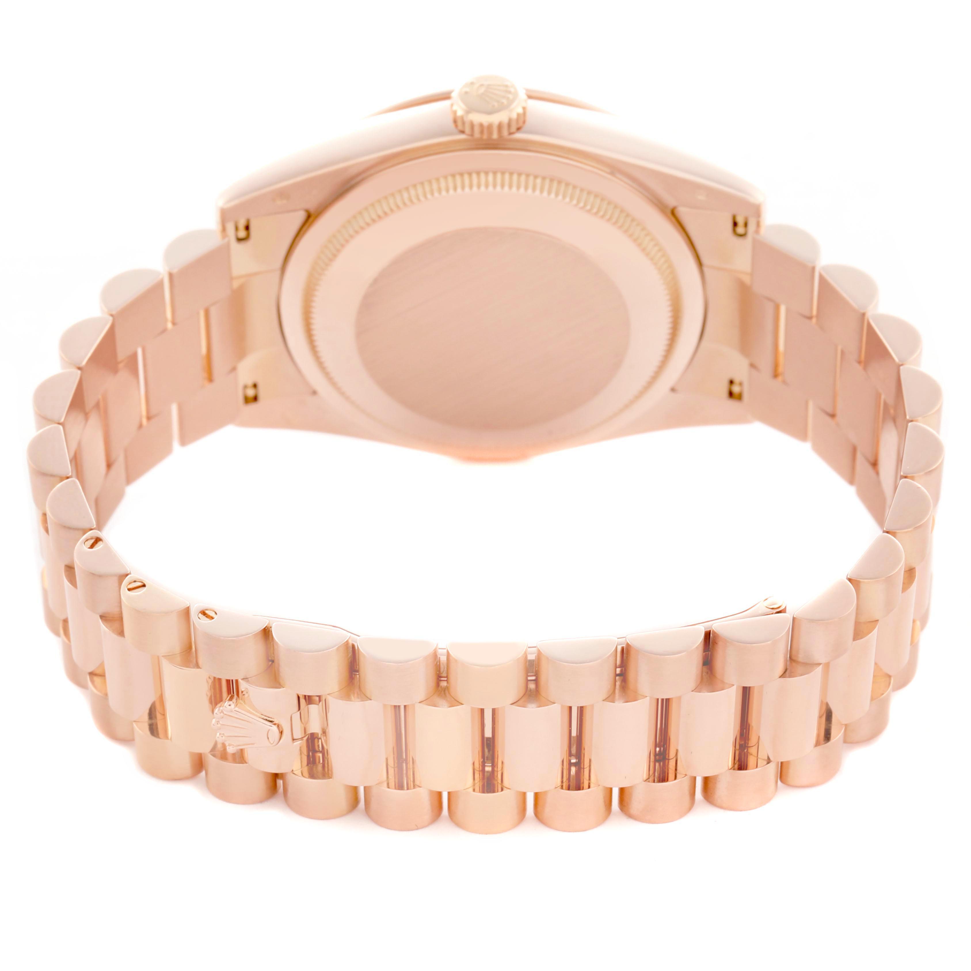 The image shows the back of the Rolex President 118235 Men's Rose Gold Silver Dial 118235 Men's Rose Gold Silver Dial model, highlighting the case back and bracelet in a rose gold finish.