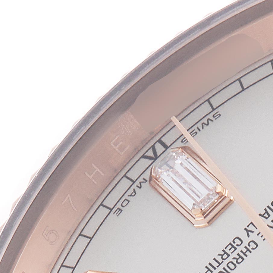 The image shows a close-up of the dial of a Rolex President 118235 Men's Rose Gold Silver Dial 118235 Men's Rose Gold Silver Dial watch, featuring an hour marker and part of the hand.