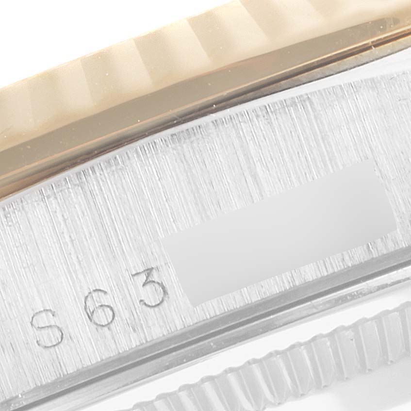 This image shows a close-up of the side view of a case and bezel of a Rolex President 18239 Men's White Gold Brown Dial 18239 Men's White Gold Brown Dial model watch.