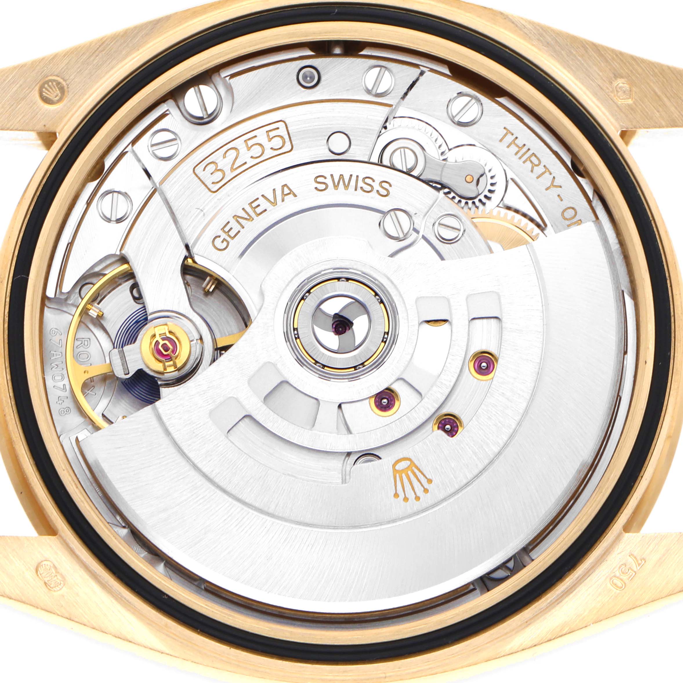 The image shows the movement of a Rolex President 128238 Men's Yellow Gold Mother of Pearl Dial 128238 Men's Yellow Gold Mother of Pearl Dial model from the back, highlighting its intricate internal mechanics.