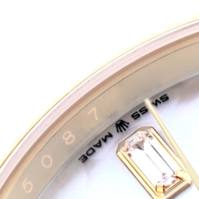 The image shows a close-up of the Rolex President 128238 Men's Yellow Gold Mother of Pearl Dial 128238 Men's Yellow Gold Mother of Pearl Dial watch dial, highlighting the "Swiss Made" text and a diamond marker.
