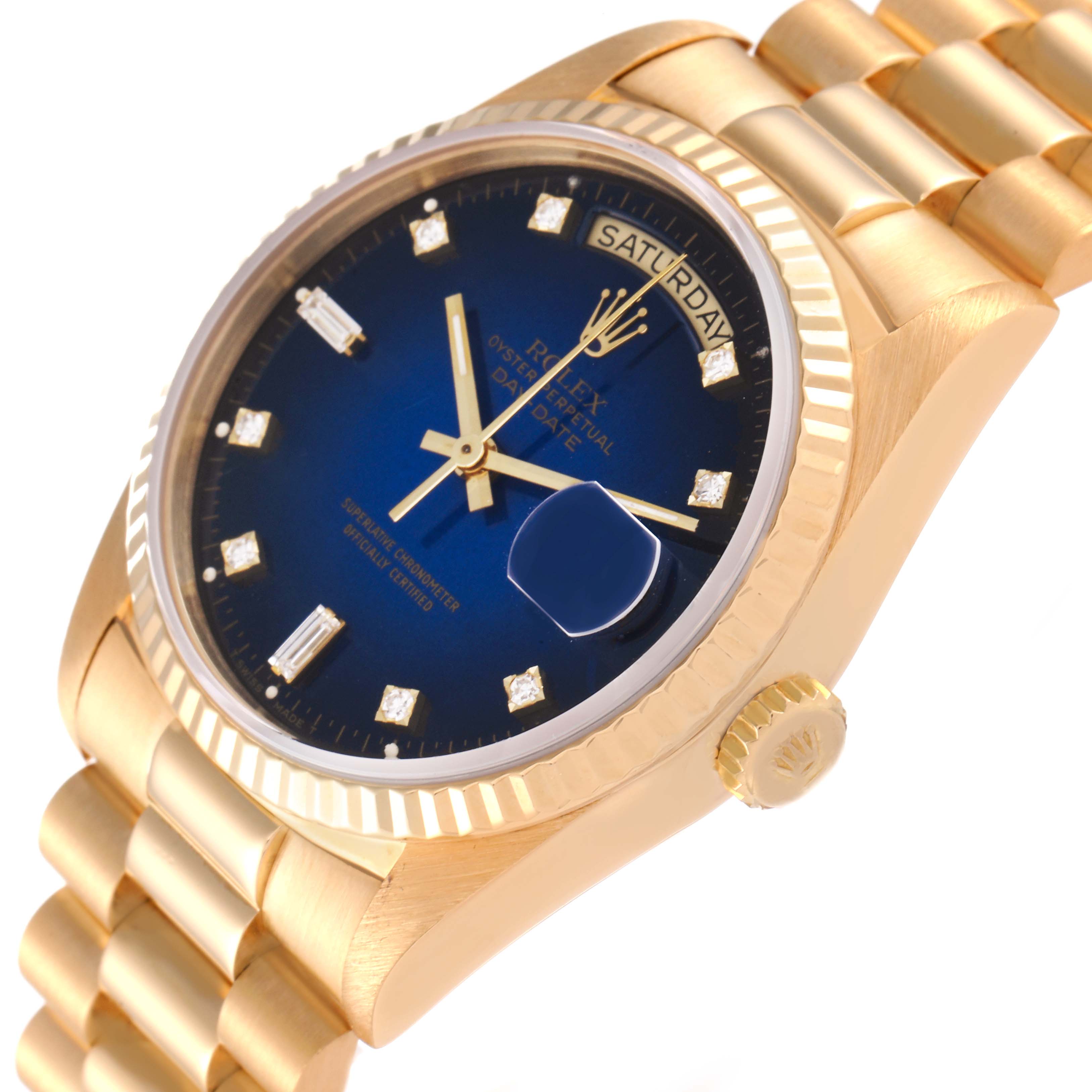 This image shows a side angle of a Rolex President 18238 Men's Yellow Gold Blue Dial 18238 Men's Yellow Gold Blue Dial model watch, highlighting the blue dial, fluted bezel, and part of the gold bracelet.