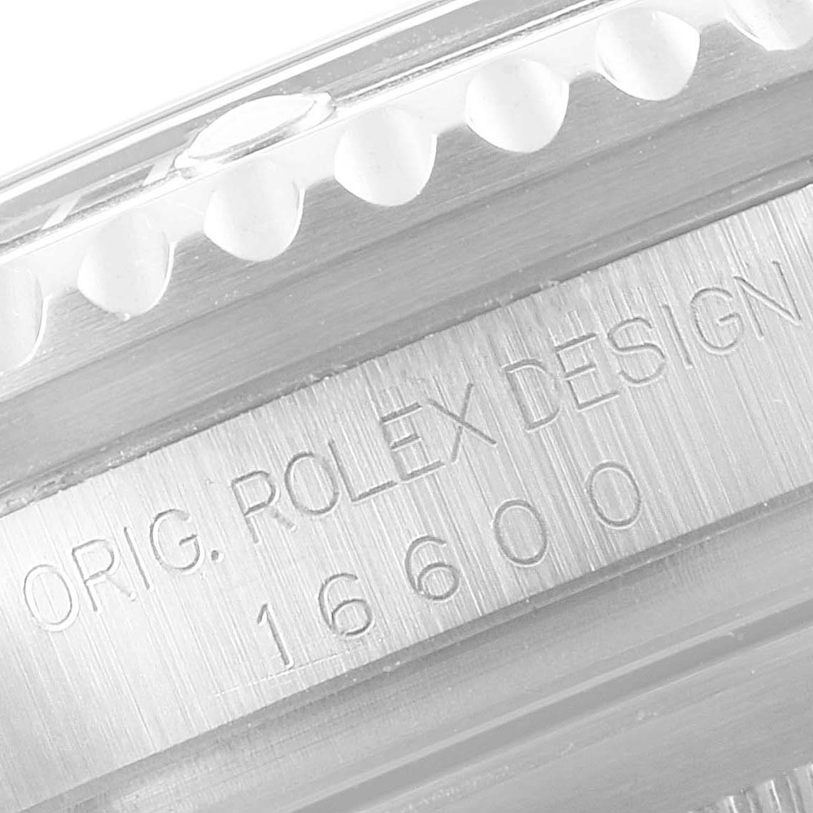 This image shows a close-up of the engraved detail on the side of the bezel and case of a Rolex Sea-Dweller 16600 Men
s Stainless Steel Black Dial 16600 Men
s Stainless Steel Black Dial 16600 watch.