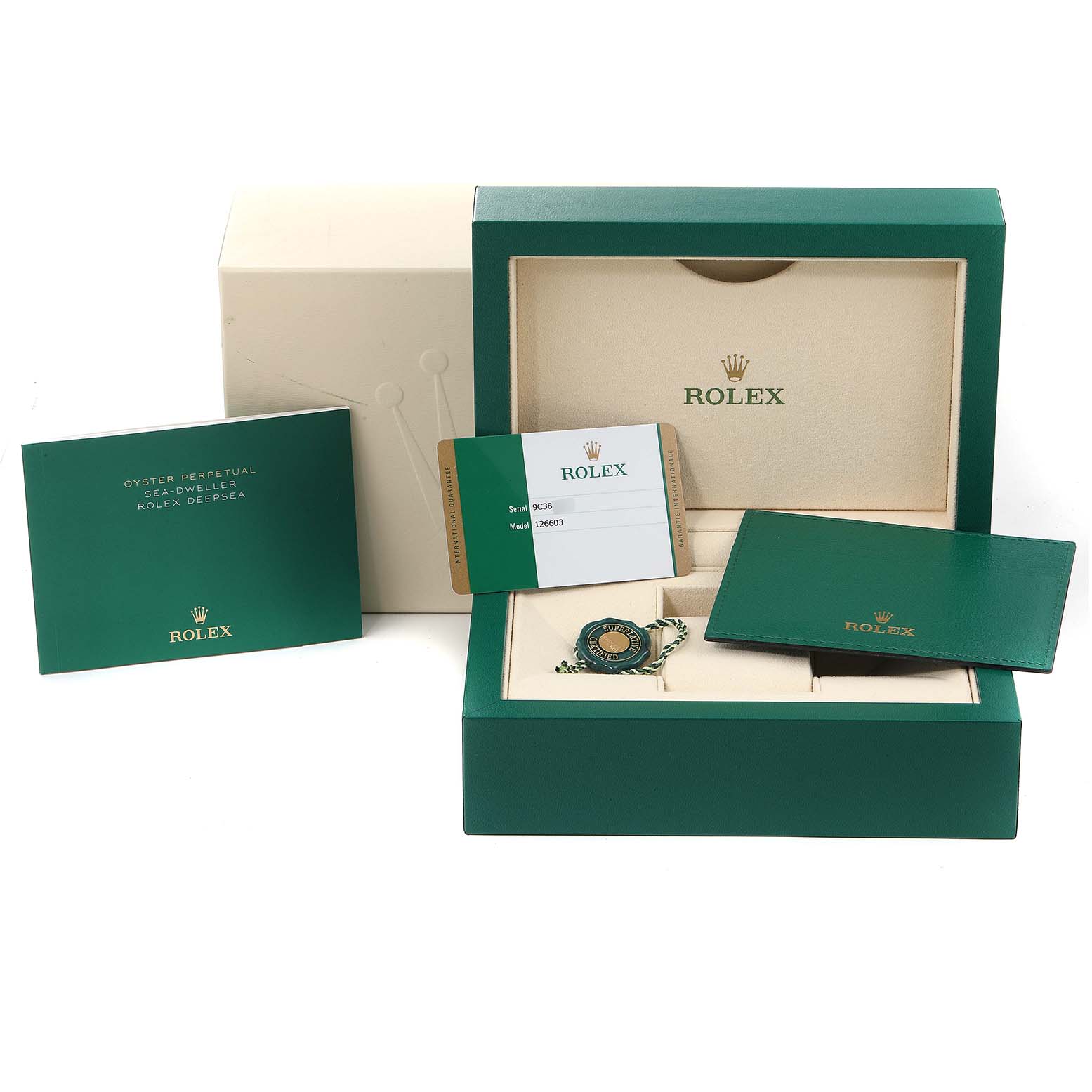 The image shows the packaging, manuals, and accessories for a Rolex Sea-Dweller 126603 Men's Steel and Gold (two tone) Black Dial 126603 Men's Steel and Gold (two tone) Black Dial watch, including the box and warranty card.