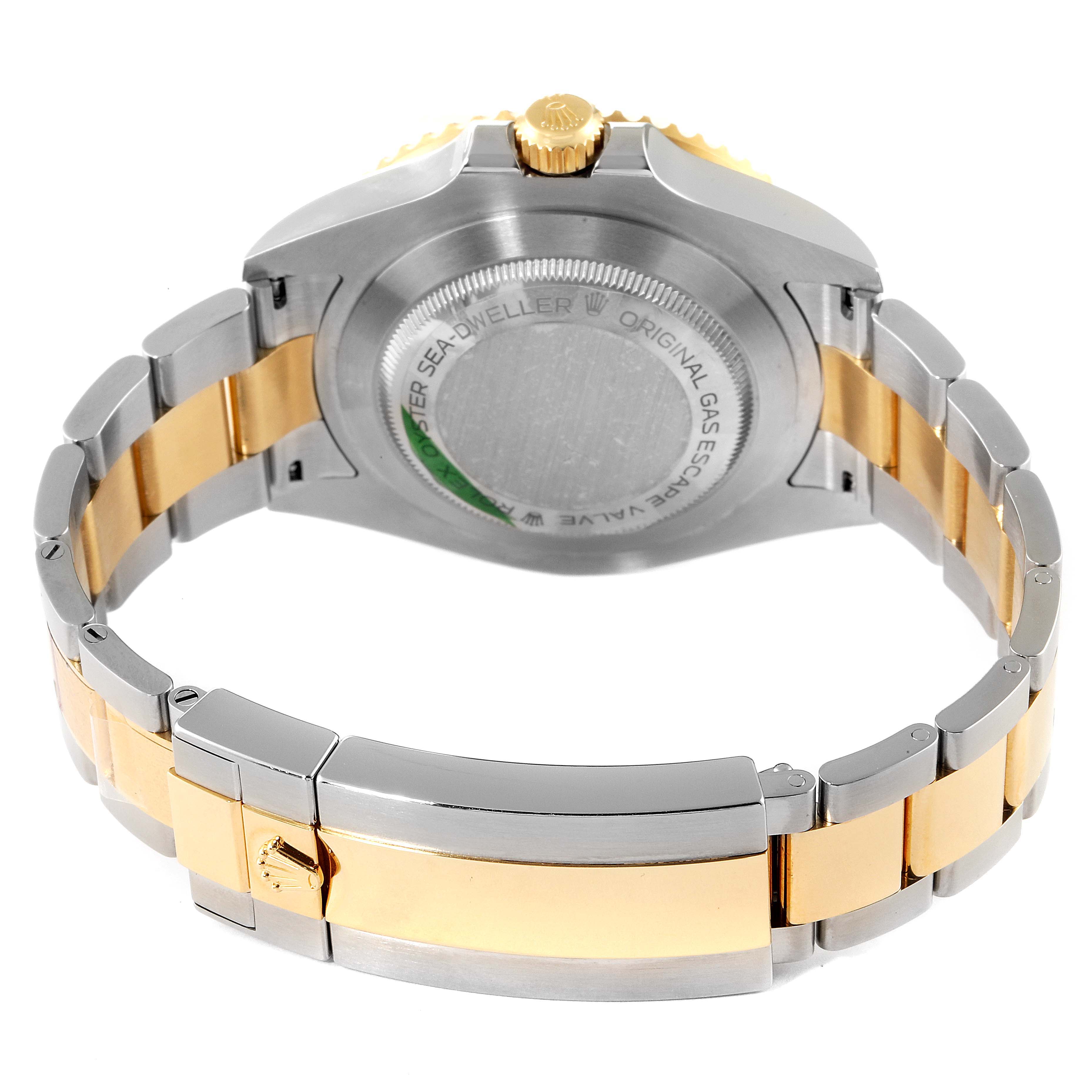 This image shows the back and bracelet of the Rolex Sea-Dweller 126603 Men's Steel and Gold (two tone) Black Dial 126603 Men's Steel and Gold (two tone) Black Dial watch, highlighting its two-tone design and clasp.