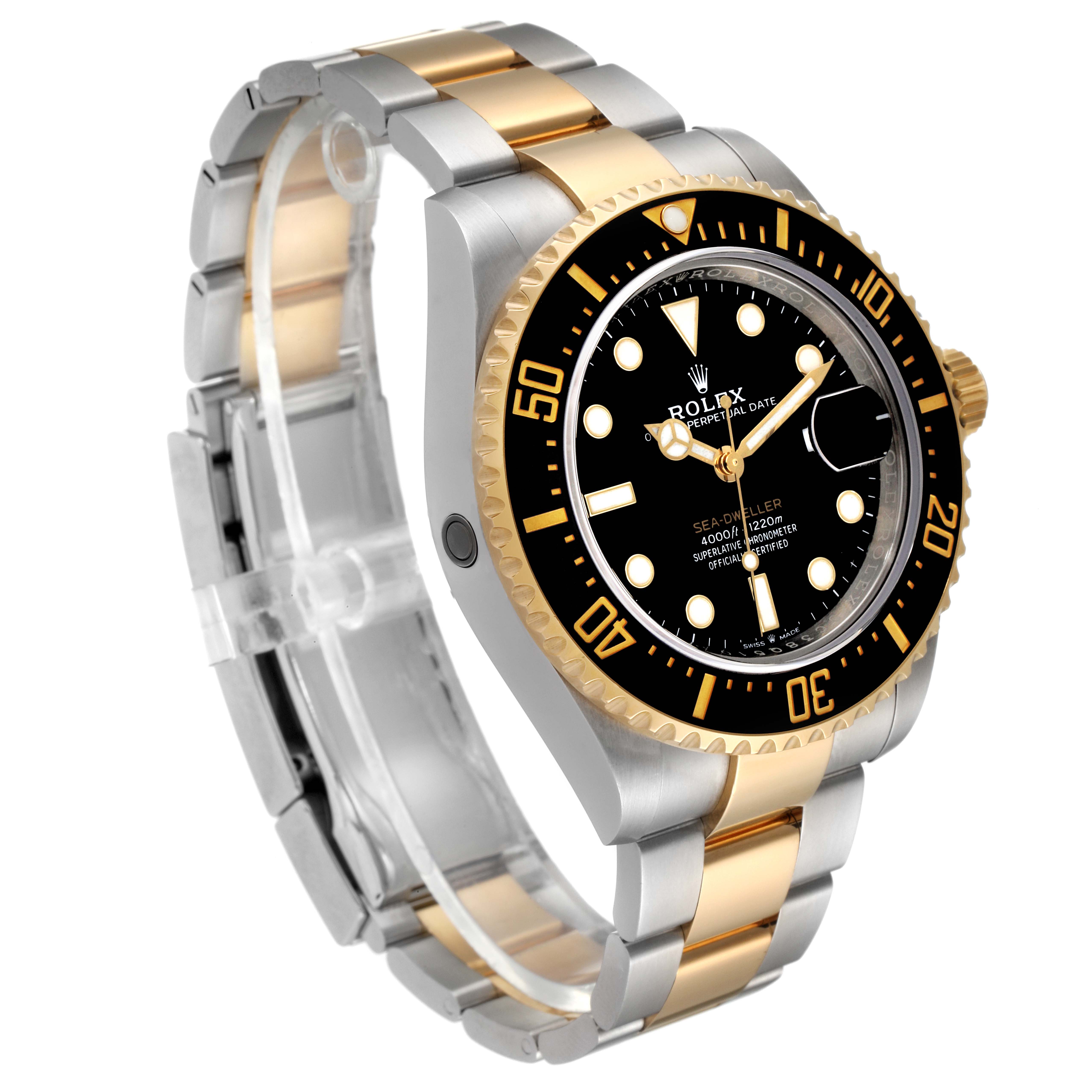 This Rolex Sea-Dweller 126603 Men's Steel and Gold (two tone) Black Dial 126603 Men's Steel and Gold (two tone) Black Dial watch is shown at an angled side view, highlighting the two-tone metal bracelet, bezel, and dial.